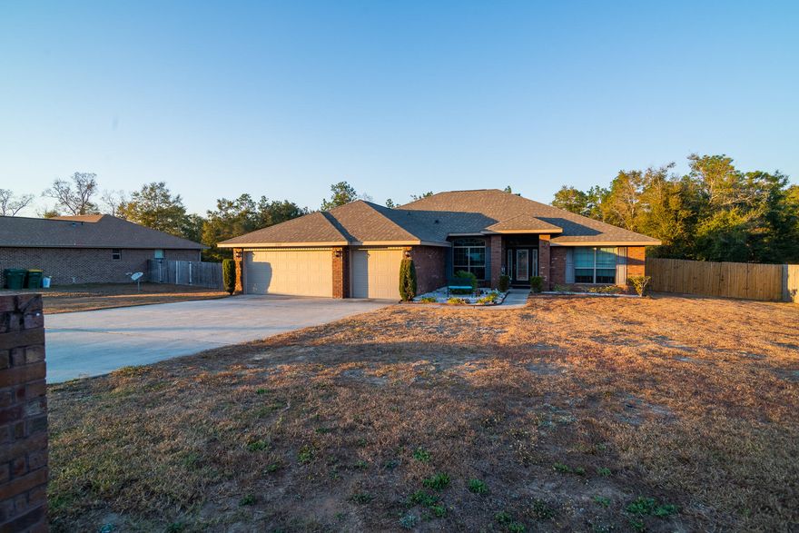 You will love this charming all brick home. This 4 bed/3 bath home with a 3 car garage and a bonus room will give you 2545 sq ft of generous space to move about (without losing that quaint, cozy atmosphere when it's time to cuddle up with a good book). This home features 3 doors that lead to the covered lanai, one leads out from a full bath. Situated in a friendly community on the outskirts of Okaloosa County, just thirty minutes from Destin's shopping, entertainment and dining. This home features a landscaping package with adds to the curb appeal. ceramic tile in all wet areas and granite counter tops in the kitchen. Included is a 1 home yr warranty and a 10 yr bonded builders warranty. Relax under your covered back lanai and enjoy the sunset.