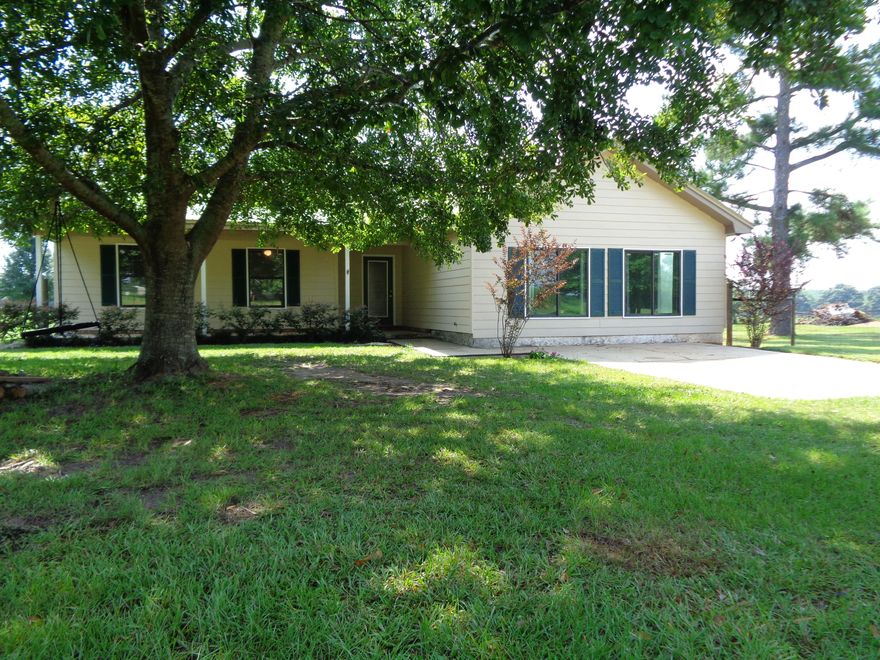 LOOKING FOR A GREAT HOME AWAY FROM THE HUSTLE AND BUSTLE OF TOWN THIS IS A GREAT BUY! THIS HOME SITS ON 2.47 ACRES AND OFFERS 3 BEDROOMS AND 2 BATHS ALONG WITH A LIVING ROOM AND BONUS ROOM. HOME HAS LAMINATE WOOD FLOORING IN LIVING ROOM, HALLWAY, DINING ROOM, AND KITCHEN. HOME HAS A GREAT LIVING ROOM WITH FIREPLACE, DINING ROOM CONNECTED TO KITCHEN WITH TONS OF CABINETS AND ALL THE APPLIANCES. HOME ALSO INCLUDES A LARGE BONUS ROOM THAT IS PERFECT FOR ANY FAMILY GATHEIRNG ROOM. FENCED BACK YARD, GREAT BARN/WORKSHOP, AND A NICE BACK DECK OFF HOME. SEE THIS ONE TODAY! MOVE IN READY