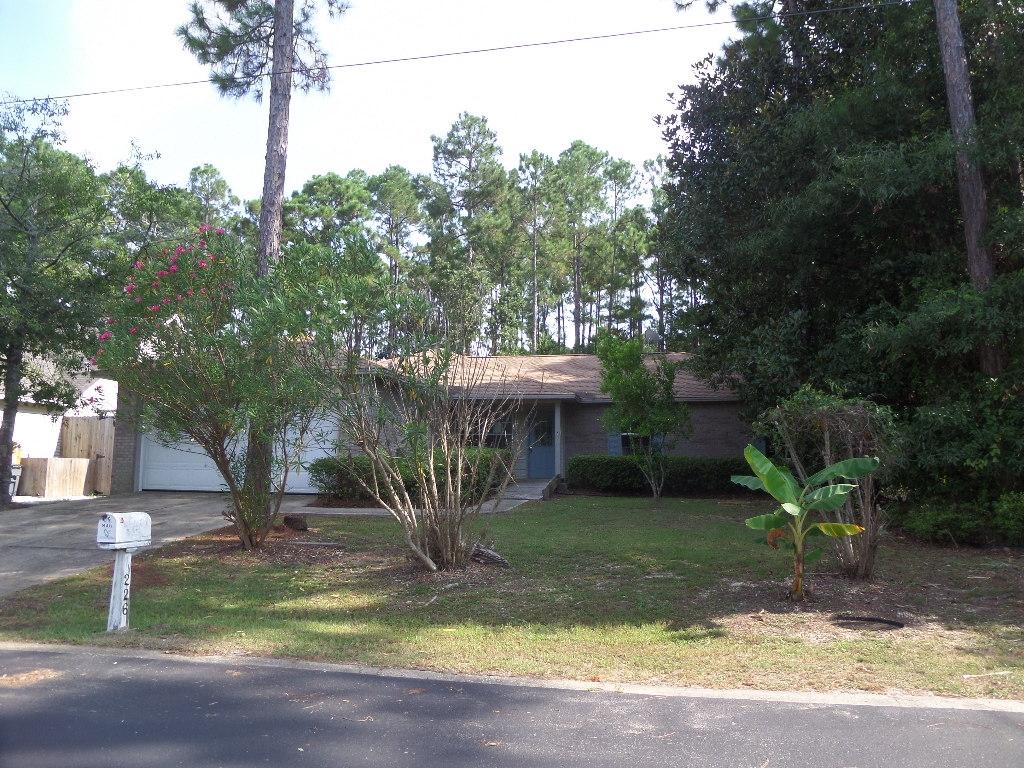 Great 5 bedroom 2.5 bath home in a nice gated neighborhood just North of Hwy 98 in Santa Rosa Beach. You will just love the floor plan in this spacious home. Enter into the great room with vaulted ceilings, dining area and a fireplace. The kitchen has a dining area and a large walk in pantry. This is a true split floor plan. There is also a large 2 car garage and huge fenced back yard. Another great thing about this home is the location. It is just minutes from the beach, restaurants, schools, shopping, hospital, & more. Come see this great home today!