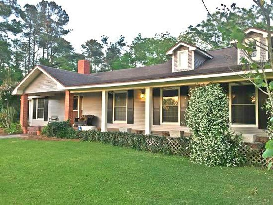 This home is exactly what happy dreams are made of! Check out this 1948 Farmhouse with newer addition which includes 10 ft. ceilings, open kitchen/dining and living room, master suite, half bath, utility room, screened in porch with outdoor fireplace and lots of new deck space! Almost 3200 sq ft with four bedrooms (could be considered five bedrooms with a study), three and a half bathrooms and over 15 acres with your very own pond!This property has so much potential as a hobby farm with a large barn that has concrete flooring and attached green house, plenty of space for your garden, pasture land and woods. Call today for your private tour!