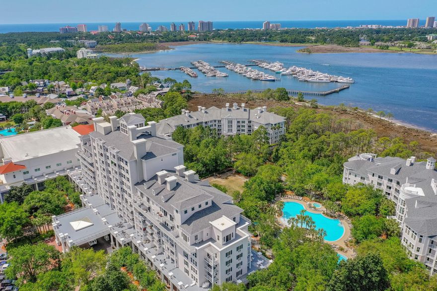 Own your own piece of Sandestin with this fabulous studio unit in Grand Sandestin that makes an ideal investment property.  Grand Sandestin hosts many conferences throughout the year offering a wonderful opportunity for rental income.  A new AC unit was installed in 2023.  Neutral light colored paint and flooring compliment the classic furnishings and attractive window treatments.  A queen size bed and queen sofa pullout provide sleeping for 4 people.  The kitchenette includes a refrigerator, microwave, sink and ample cabinetry allowing you to stay in rather than eating out.  Located on the 4th floor, the private balcony suggests a fun place to relax and observe the resort activities below.  A new mattress and flatscreen TV were recently added.  A new water heater was  installed in 2022. Sandestin resort amenities include world famous golf courses, rubico tennis courts, miles of nature trails, a marina, several community pools, private deeded beach access, year round outdoor concerts and a free resort shuttle.