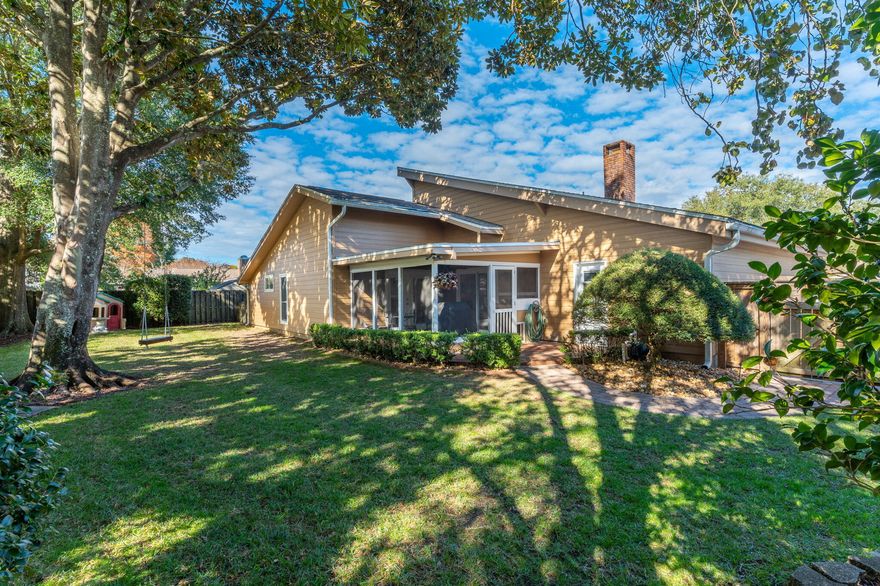 This is your chance to own one of the most beautifully maintained homes in the highly desired Lake Lorraine Estates. This charming 3 bedroom 2 bath home has two spacious living rooms and a bonus second story loft that works perfectly as an office or playroom. The meticulously kept .25 acre parcel has the feel of a private oasis with multiple outside living or entertaining areas, including a screened in back patio and two paver patios, all surrounded by mature trees and neatly manicured landscaping. In the spring and summer you will want to spend your days in the screened in patio and in the winter you will be able to warm up by the wood burning fireplace in your cozy den with 20 foot vaulted ceilings.