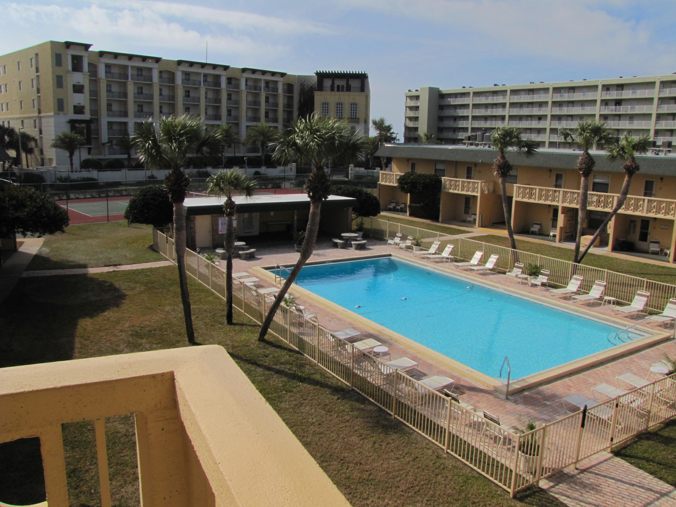3rd (Top) floor 1BR/1BA condo very close to the beach! You'll love it! Super nice onsite amenities including a tennis court, basketball goal, and a big pool all just steps from the sugar white beach of the Emerald Coast of Florida! Fully furnished and rental ready! Don't miss this one! Conveniently located on Okaloosa Island to restaurants, bars, and several tourist attractions to keep everyone entertained! Buyers should verify all measurements and information. Water, sewer, cable, internet, trash removal, and pest control including bed bug protection are included per Association Mgmt!