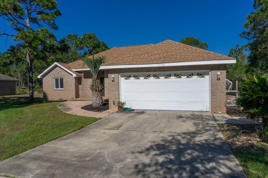 Well maintained brick 3 bedroom 2 bath 1952 sq ft home in the well known Holley by the Sea community. This open floor plan includes travertine flooring, formal dining room and cathedral ceiling. Kitchen offers breakfast bar, granite tile counters, maple crowned cabinets, pantry and eat in breakfast area. Let's not forget the heated and cooled Sunroom with to entry points from living room and Master suite. Master Suite has walk in closet, dual cultured marble vanities, whirlpool tub and separate shower. Step out outside onto the back deck that leads to fully fenced large backyard with 10x16 outbuilding.