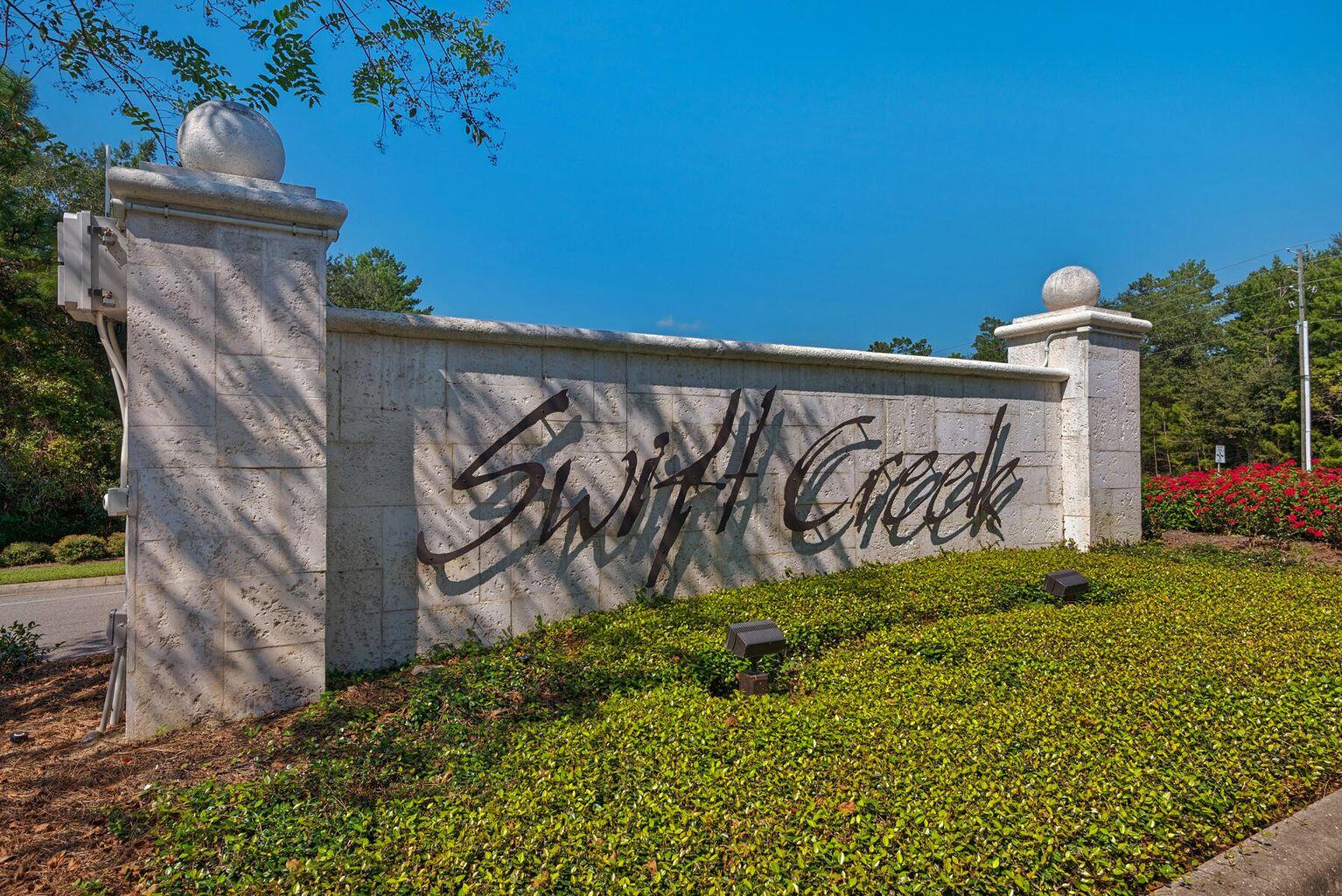 Nestled in the exclusive Swift Creek neighborhood, this magnificent POOL home exudes opulence at every turn. Tucked away on a serene cul-de-sac, this estate offers a seamless blend of grandeur and tranquility, highlighted by soaring 14-foot cathedral ceilings and breathtaking views of the private pool through expansive windows. The stunning kitchen remodel features pristine 42-inch cabinetry, luxurious quartz countertops, and top-of-the-line stainless steel appliances, including a gas stove with a striking tile backsplash. The open-concept family room with custom cabinetry and a cozy fireplace sets the stage for ultimate relaxation. The home features three master suites ensure unparalleled comfort, while the secluded 4th bedroom versatile living space/bonus room/office. More... Step into your private outdoor paradise: a stunning in-ground, heated saltwater pool with a cascading waterfall and elegant statues. The expansive Lanai is an entertainer's dream, complete with a summer kitchen featuring a built-in vent hood, mini refrigerator, and cooler. Surround sound wiring sets the stage for unforgettable outdoor gatherings. Enclosed by a custom screen and surrounded by beautifully landscaped pavers, the lush greenery and flowering plants create a sensory haven. The Master Suite, positioned at the back of the home, offers a peaceful retreat w/ soaring cathedral ceiling, 2 generous walk-in closets, and a newly renovated spa-inspired bathroom with luxurious fixtures, including a standalone soaking tub and custom shower. The newly updated laundry room adds convenience with additional cabinetry, granite countertops, and a utility sink. The three-car garage provides ample space with a double car entry, single bay side entry, and an gorgeous oversized and extended paver driveway. The home can be sold FULLY FURNISHED! This home offers unparalleled luxury and functionality at every turn.
Swift Creek in Niceville, Florida, is a desirable family-oriented master-planned community featuring custom and semi-custom homes. Amenities include jogging trails, basketball and tennis courts, a playground, swimming pool, and clubhouse. The community has covenants to protect home values and maintain its character. It's less than a 15-minute drive to Eglin and 5 minutes from local schools. Centrally located between Eglin and Destin, it offers easy access to shopping and schools. Zoned for top-rated public schools, Swift Creek also offers potential access to Collegiate High School. The area provides various recreational activities, including golf courses, marinas with boat storage, and nearby Destin beaches.