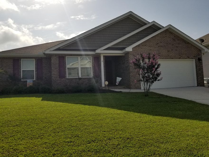 Wow this home will not last long! When entering the home your eyes will be drawn to the arch doorways. The Booth floor plan offers an open concept from the kitchen to the family room which makes entertaining a breeze. The home features vinyl plank floors in the main living space and carpet in the 4 bedrooms. The master bath has a garden tub and a walk in closet. Sit out back under your covered back porch and drink your morning coffee .The yard has a sprinkler system to help keep your grass green year round.This home is on the very south end of Crestview which makes travel time to nearby bases a short commute. This home still carries the builder's 10 year structural warranty. The neighborhood has underground utilities and county taxes!!! Buyers to verify measurements