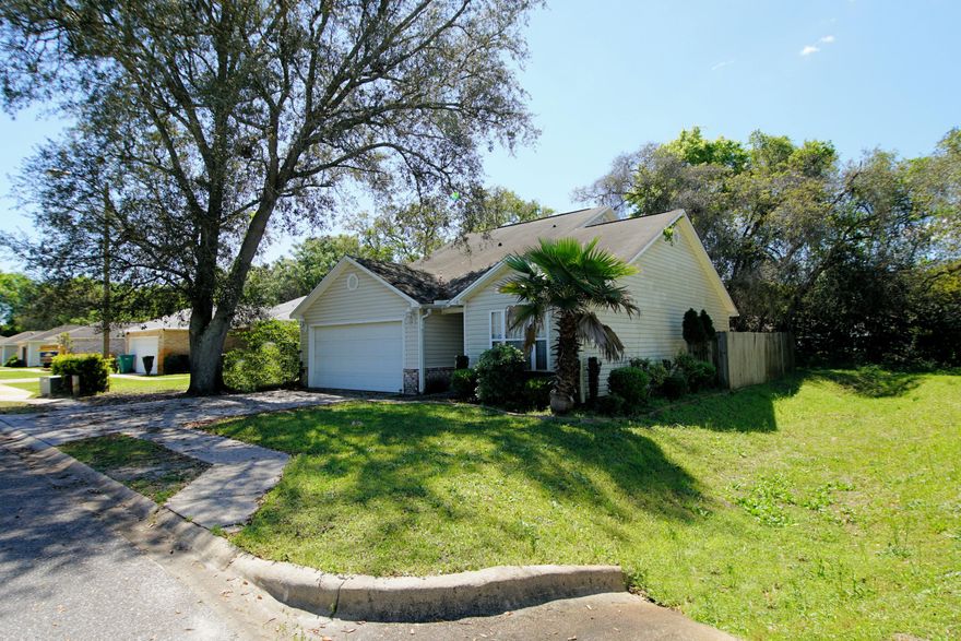 Price Reduced! Seller offering NEW ROOF prior to closing with full price offer!This home has it all! HUGE closets in every room with added walk-in attic storage! The master is on the MAIN FLOOR with its own private bath, complete with soaker tub and spa shower head. There is an additional half bath downstairs and the living room opens to the good sized backyard (lots of green space for the neighborhood!). Upstairs, you have two additional nice sized bedrooms with great closet space (worth restating!). Washer/ Dryer conveys with home! With a two car garage, and on an end lot so offering extra space and privacy, this home is ready for new owners. The location is ideal-centrally located to both bases, shopping, and the BEACH, and tucked away in a quiet neighborhood.