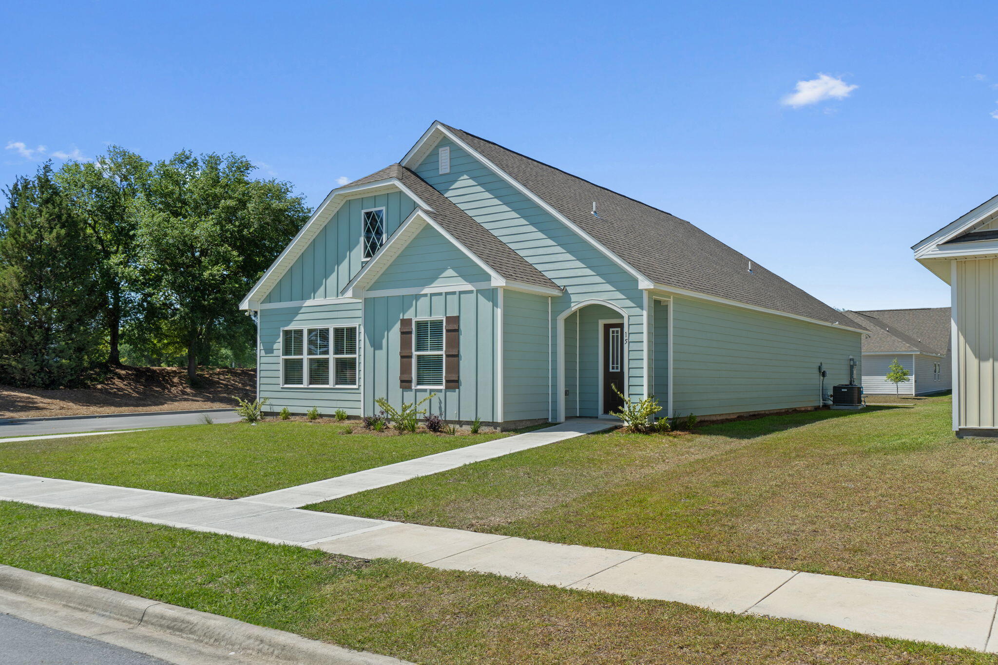 CORNER LOT! The Lauderdale 1 Model home by Valor Communities is the one you've been waiting for. With your primary bedroom and huge walk-in closet on the first floor, you'll have all the space you need. Enjoy cozy Florida nights in front of your modern, LED fireplace or on your covered porch area. Our Vaulted ceilings ensure your new home feels open and welcoming. With quartz, luxury vinyl flooring, and hardiboard exterior already included in our features, you'll be impressed at what this home has to offer! All bedrooms and baths are on one level. Owl's Head East has a beautiful park space with walking trails and a gorgeous spring fed lake.
