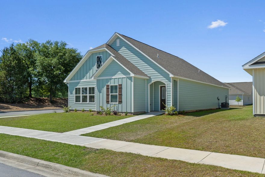 CORNER LOT! The Lauderdale 1 Model home by Valor Communities is the one you've been waiting for.  With your primary bedroom and huge walk-in closet on the first floor, you'll have all the space you need. Enjoy cozy Florida nights in front of your modern, LED fireplace or on  your covered porch area. Our Vaulted ceilings ensure your new home feels open and welcoming. With quartz, luxury vinyl flooring, and hardiboard exterior already included in our features, you'll be impressed at what this home has to offer! All bedrooms and baths are on one level.  Owl's Head East has a beautiful park space with walking trails and a gorgeous spring fed lake.