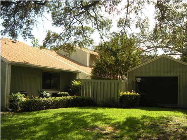 SHORT SALE! Patio home is available once again. List price is approved by lender according to most recent appraisal. This updated end unit is a 2 bedroom patio home that is in the heart of Bluewater Bay. It offers a renovated kitchen with beautiful wall decor, new Silestone countertops and new cabinetry. Updated lighting fixtures and fans have recently been installed, and the appliances convey. Separate Breakfast nook with sliding doors to the patio. The living room is quite spacious with a wonderful wood burning fireplace with stone facade. The Florida room, with vaulted ceilings, is accessed from the dining area. There is a generous size master bedroom with walk-in-closet, which offers plenty of hanging space and there is also a private patio off the master bedroom. Wood