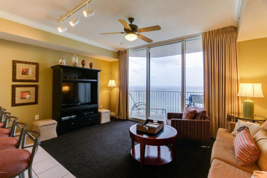 EXCELLENT VALUE & PERFECT FLOOR AT TIDEWATER BEACH RESORT!! LESS THAN ONE MILE FROM PIER PARK! CONVEYS WITH PRIVATE EXTERIOR STORAGE CLOSET. This unit is beautifully furnished, close to the elevator & stairwell and best of all...it is on the 12TH floor which makes for a great rental unit This comfortable ''K'' Floorplan (817sqft; 1Bed, 2Bath + Bunk sleeps 6 with king size bed in the master, seperate bunk room, and a sleeper sofa. The property features 9 foot ceilings and tile in foyer, hall, kitchen and baths, crown molding in the living/dining area, and granite kitchen counter-tops. The views from this unit are incredible as you relax on the balcony or in the living room. East corner location within the development offers awesome views and shelter from the scorching afternoon sun.