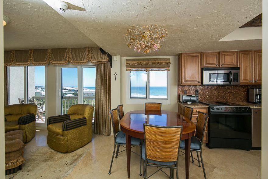 This quiet West end unit is located in one of the most pristine locations boasting spectacular views of both the Gulf of Mexico and Lake Powell. This two level 2BR/2.5BA unit has Bamboo stairwell, Travertine flooring throughout with bamboo inlays and granite accents. Waterford cut-crystal light fixtures, upscale appliances and custom wood cabinetry make up the kitchen. Unit has built in granite bar with wine cooler and has been professionally decorated with high quality furnishings. The Living room, kitchen and half bath are located on main level with a balcony over looking the Gulf. Master and Guest Bedrooms are located upstairs, both full baths. Master has build-in Armoire, Jacuzzi tub and balcony over looking Lake Powell. HOA includes Heating, Air and Hot water.