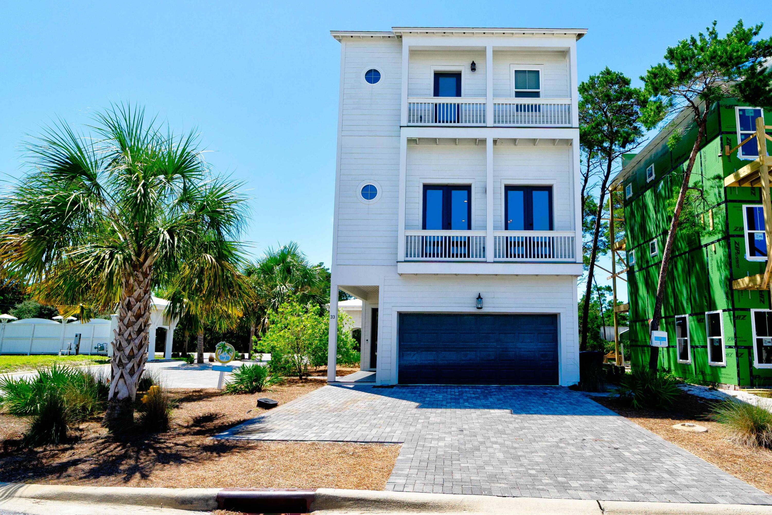 Welcome to Endless Summer, a beautifully furnished beach retreat that is move in ready and located in a highly desirable neighborhood in Inlet Beach. The Ivy at Inlet Beach is a private, rental friendly community that's within close proximity to fine dining, shopping, Scenic 30A, Panama City Beach, and it's within a 1/2 mile to a large public beach access area on the Gulf of Mexico. This 4-bedroom, 3.5 bath house is perfect for beach living, enjoying family time or entertaining with its ample outdoor living space provided by the two large deck areas on the back of the house and the bright open floorplan. Upgrades include 10- and 12-foot ceilings on the first and second floors, gourmet kitchen with large island, quartz countertops, stainless appliances, vented hood and large gas cooktop...