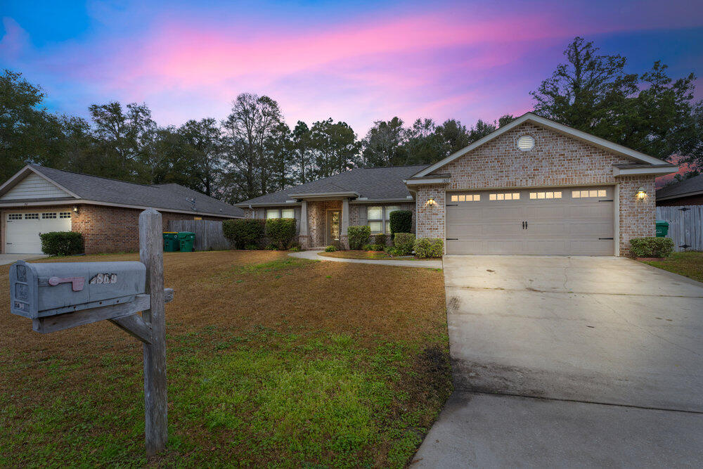 No HOA! Check out this beautiful open concept home on a quiet dead-end street! This home offers a split floor plan with a spacious kitchen and living room area that's perfect for entertaining. The kitchen features granite counters and high ceilings with recessed lighting for a modern and cozy feeling. The main bedroom has tray ceilings and connects directly to a wonderful bathroom with double vanity and separate tub/shower. Step into the fully fenced backyard and enjoy a perfect spot for barbecues or morning coffee. Come see it today before it's gone!