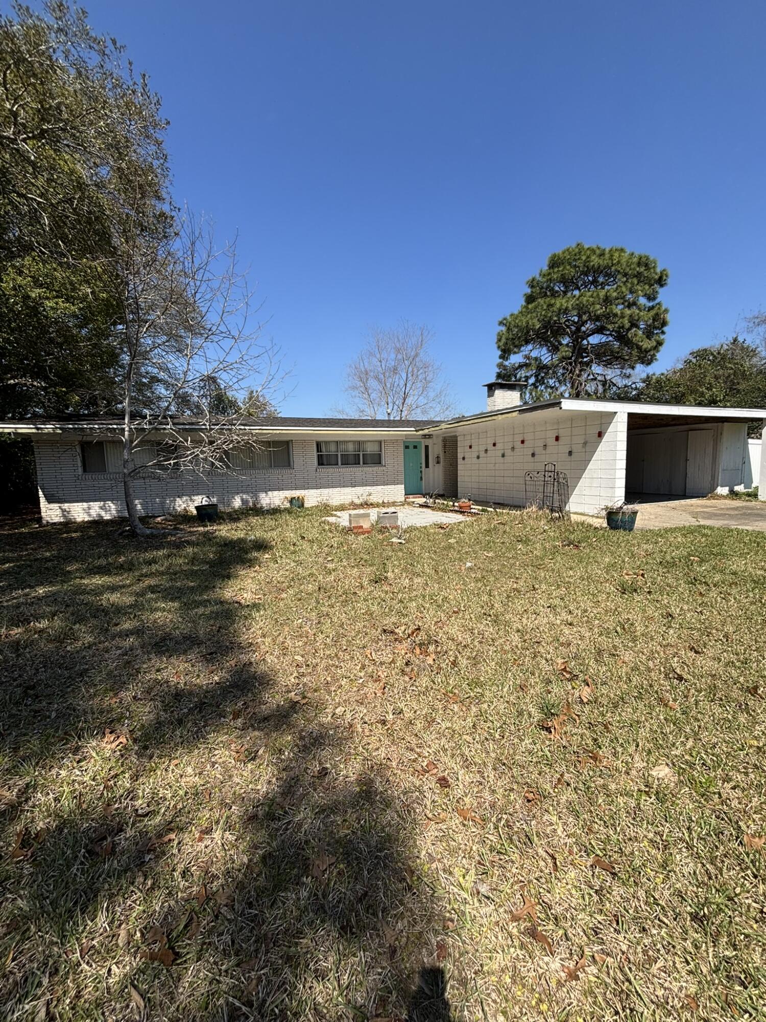 Welcome to Poquito Bayou! This mid-century beauty still has Terrazo and Parquet flooring. While it needs some TLC, the bones of this home are strong. Many upgrades have been completed. Kitchen counters and cabinets - 2022. HVAC is GAS 2020 - Roof 2016 - Water heater is Rennai - 2020. Water line from street to house was replaced 2017. Copper wiring with ground. Lawn pump and sprinkler. Huge lot! 2018 W/D convey. Stove/oven-Microwave 2023. 20' x 12' Hardi-Plank shed. 2020. Termite bond with Terminix. Solar panels do NOT convey. Seller is taking them to new home.