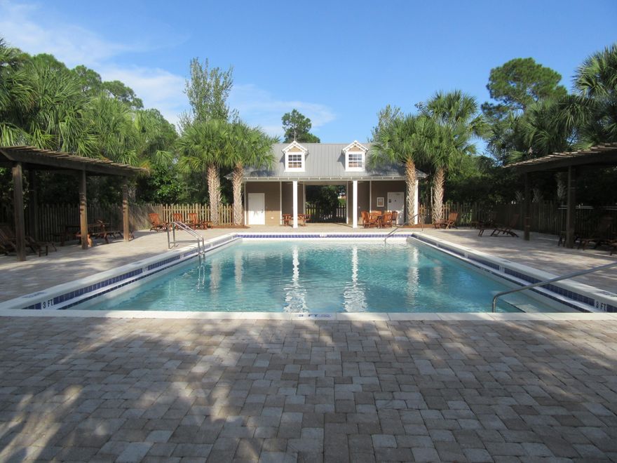 Hidden Grove is a quiet gated community of 78 lots with beautiful Craftsman style houses, excellent tropical and natural vegetation landscaping, large community pool, lighted paved streets, walking trails and located between Sandestin and Scenic 30A. Access for boat launch is .7 mile at end of East Hewett on Choctawhatchee Bay for boating and fishing. Sandestin with Baytowne Wharf and Marina and Grand Boulevard with shopping, excellent restaurants, movie theatre, etc. is just to the west, very close in proximity. Topsail Hill Preserve State Park with 3.5 miles of beach frontage is just two miles. This is Florida living at its best! Build your dream home on this nice lot.