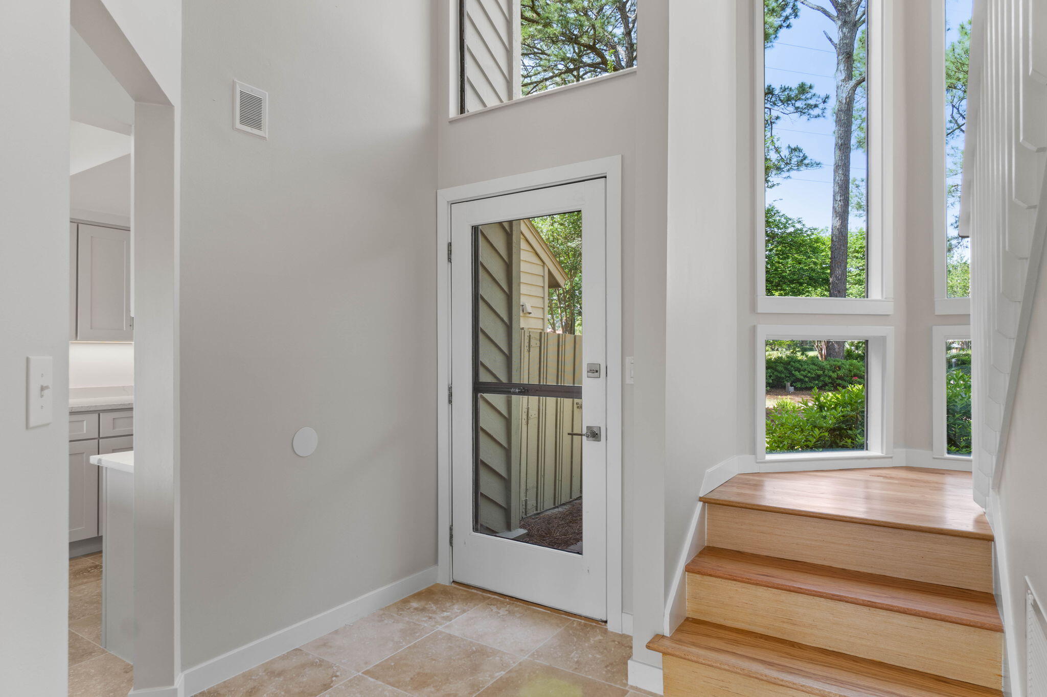 Looking for a FULLY remodeled property in Sandestin? This beautiful light filled 2 bedroom 2 1/2 bathroom lakefront townhome with serene views of the lake, golf course or bay from every room was just finished with gleaming imported Italian Travertine floors on the first level and 3/4 ' solid wood oak planks upstairs.Fully remodeled kitchen with lots of soft close shaker cabinets & drawers, quartz counters, a custom enclosure for the refrigerator and washer & dryer, all brand new high end stainless steel appliances, faucet & sink. Ceilings were refinished and the entire interior painted, all new baseboards, whole house re-wired to add recessed lighting and ceiling fans.Beautiful primary bedroom with large windows looking over the lake, golf course and bay has an ensuite bathroom with brand new imported Italian Travertine floors and walk-in shower with sliding glass enclosure, new quartz counters, fixtures, toilet, lighting and mirrors. The large guest bedroom also has breathtaking views and an ensuite bathroom with new imported Italian Travertine, quartz counters, toilet, fixtures and mirror, and a shower tub combination. Outdoors relax on the new expansive wood deck with new bench, bbq and partial fence for added privacy. Enjoy the peace of mind knowing the entire exterior of the building has also been recently painted, as well as a new air conditioner installed and new wiring for the golf cart charging. This like new townhome is located in a prime location in the Fairways on the Links Golf Course (holes 1+6) and only 5 homes from the new Sandestin owner's pool, a golf cart or bicycle ride away from all the wonderfull amenities of Sandestin and will make a great primary home, second home, or lucrative rental investment property. The Sandestin Golf and Beach Resort features more than half a mile of pristine beaches with beachfront restaurants and bar, beach chair service and rentals for all your watersport activities, bay with a 226-slip marina, four championship golf courses, world-class tennis courts, bocce ball courts, a fitness center, spa and celebrity chef dining. Shop, dine and play at the charming pedestrian village, The Village of Baytowne Wharf, Grand Boulevard, or The Market Shops. Inside the gates of the resort, residents enjoy a balanced lifestyle of high-class living, spanning the 2,400 acres from the beach to the bay. Everything within the gates of the resort is accessible by golf cart, bicycle or tram. Don't miss the chance to own this unique piece of paradise at the Sandestin Resort.