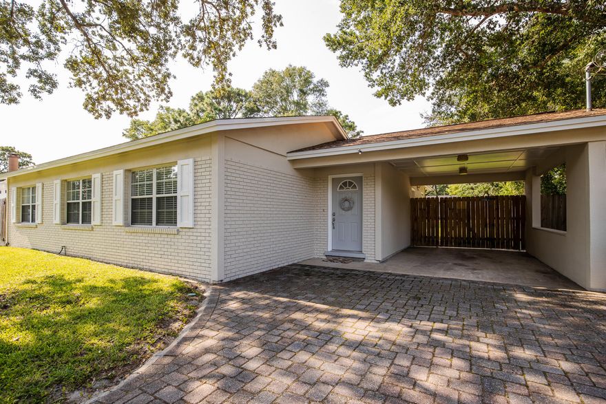 Amazing, renovated home - Recently Updated Electrical, Wired for Ethernet, Rinnai Gas Water Heater, Double Pane Windows, Plumbing, Floors, Kitchen, Bathrooms, Fixtures and Doors. Roof was replaced in 2017. This home has so many upgraded finishes with open floor plan! Kitchen features Custom Cabinetry, Graphite Granite Counter Tops and Bar Top Island with Stainless-Steel Appliances. Huge Master Bedroom with large Bath - including Walk in Closet and large walk- in tile Shower. Home sits on double lots and has beautiful, custom paved driveway. Back yard is an absolute Paradise with custom built Stone Firepit! Back yard also has a Huge Farmhouse perfect for storage or Man Cave or She Shed. Home also has well pump with irrigation system. This is a great Home! With much TLC...