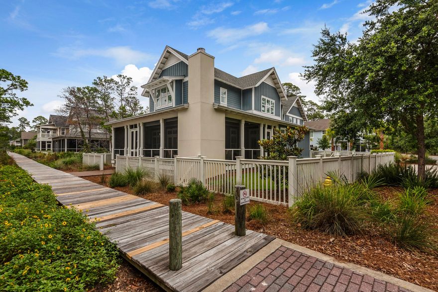 Nestled in the gated beachside community of WaterSound West Beach, this five-bedroom home is just steps from the beaches of South Walton as well as one of its rare coastal dune lakes. This property includes a separate carriage house, two-car garage, walnut plank floors and a gourmet kitchen with high-end appliances, including a duel-fuel stove with a steam oven and double griddle. Relax on your screened-in wrap around porch with a gas fireplace, all-weather privacy shades and a summer kitchen. This two-story, five-bedroom, five and a half bath home is on a corner lot with a backyard big enough for your own swimming pool. You can also enjoy the community's pool, playground and private beach access. Call today to schedule a private tour of an exceptional home.
