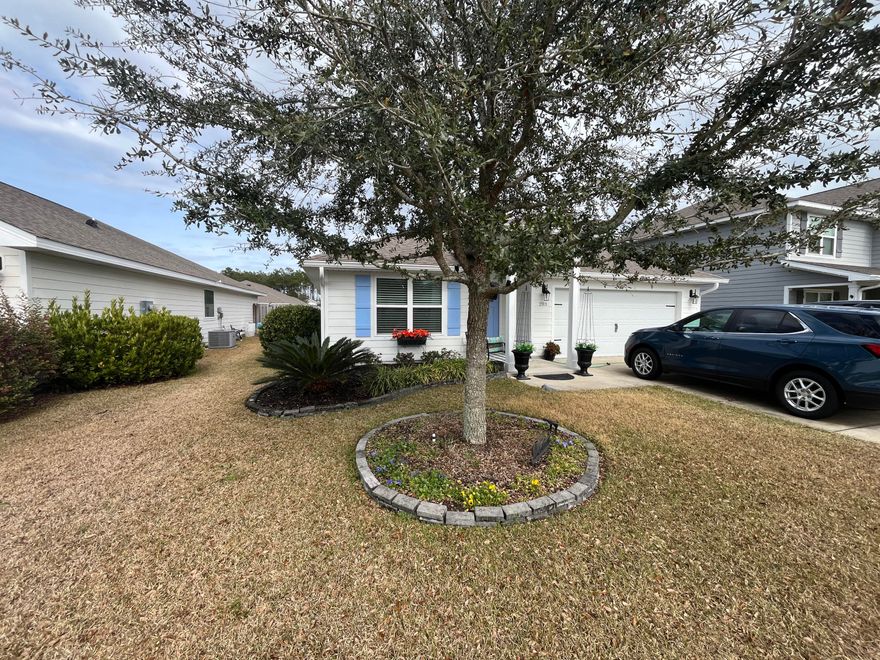 Welcome to this beautifully maintained move-in ready home in the highly sought-after Hammock Bay community! Built in 2021, this 4 bedroom, 2 bathroom residence offers 1,775 square feet of modern living space with an open and functional floor plan designed for comfort and convenience. The spacious living area flows seamlessly into the kitchen and dining space, creating a perfect layout for everyday living and entertaining. The kitchen features modern finishes, ample cabinetry, and a large workspace ideal for preparing m