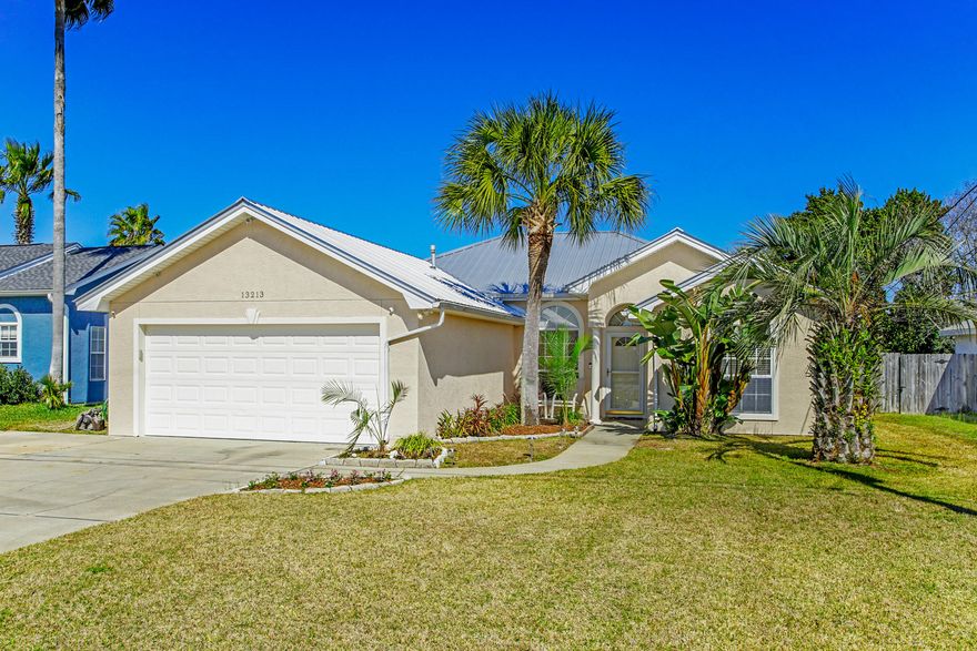 CURRENTLY UNDER CONTRACT,Seller accepting backup offers.If you are looking for a home that is move in ready South of 98 only blocks from the beach, this is it!! Immaculate 3 bedroom, 2 bath with new exterior paint, metal roof, HVAC, solar panels for the pool and more! Great kitchen with plenty of cabinets, stainless steel appliances, and breakfast bar. The master suite is located on the opposite side of the house from the extra bedrooms. Spacious back yard features a privacy fence, summer kitchen/bar area, and fabulous swimming pool. This home is perfect for anyone looking to be close not only to the beach but also shopping, outdoor concerts, and other activities and entertainment. Golf Cart Friendly Neighborhood! Buyer to verify all data and dimensions.