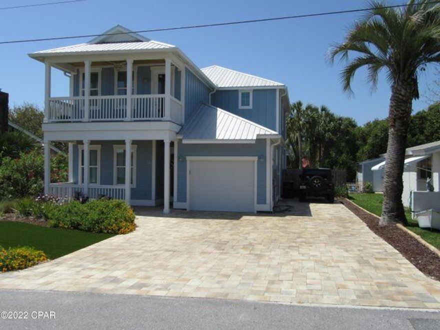 Welcome to the beach! Enjoy this 6 bedroom, 4 bathroom home with your own private 12x25 salt water pool. Only a short walk to the sand & emerald green waters of the Gulf. Home features all impact rated windows & doors, galvalume metal roof, 2x6 exterior walls with r-19 insulation, 10-ft. ceilings with 8ft doors, both interior & exterior. The kitchen boasts Kitchen Aid appliances, custom cabinets with crown molding, island with marble top and quartz  remaining tops, pot filler and tiled backsplash. Luxury plank vinyl floors in the entire home. One master bedroom/bathroom on each floor. Parking for 6 vehicles. Short-term rentals allowed and projections are $165k. annually. This home will make an incredible rental or primary home!
