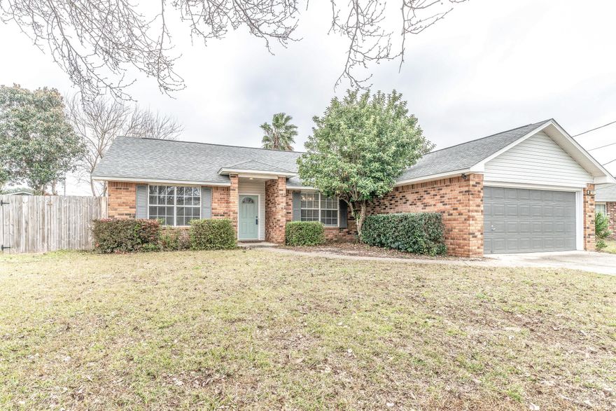 Welcome home! This beautiful 3 bedroom 2 bath home is ready for new owners. Recently renovated in 2016 with gorgeous laminate flooring, granite countertops in the kitchen and baths, new carpet, and a new roof! The master bath features double vanities and his and her closets. The two additional bedroom are a great size for children or guests. This home feels larger than 1,601 square feet! And that's not all. The expansive fenced in back yard is sure to impress as this property is positioned on .25 acres. This is truly a must see. Call today before it is gone!