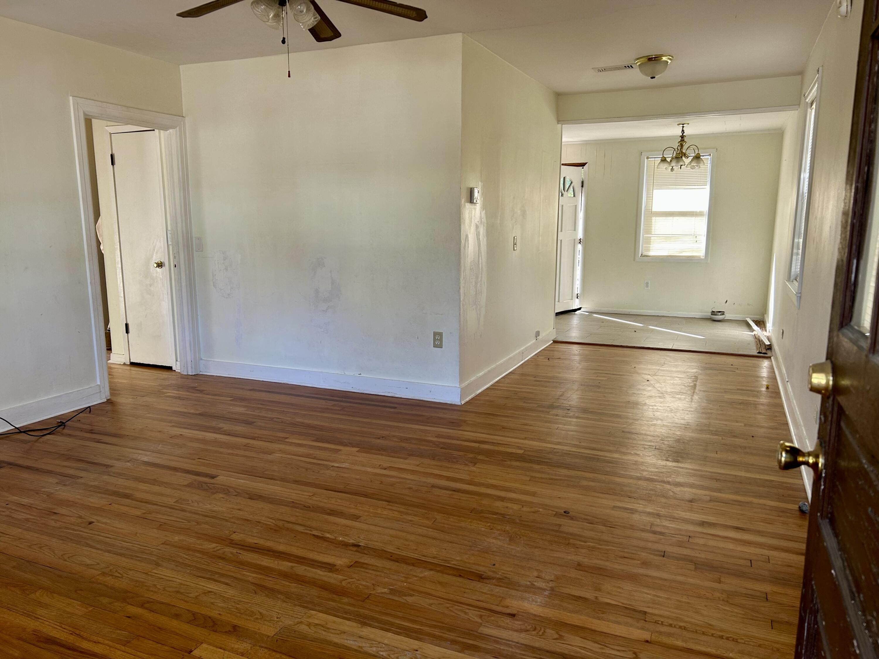 Located in the Historic District just 2 blocks from Lake Defuniak, this 2 bed/1 bath Florida Cottage style home is brimming with potential. Home sits on a 1/4 of an acre and has a chain link fenced back yard. A rental since 2017 it has the potential to continue to be an income producing property or a quaint permanent home with some thoughtful updating and repairs. Metal roof in 2017, floor joist repaired and replaced in 2017, and HVAC updated approx. 2018.