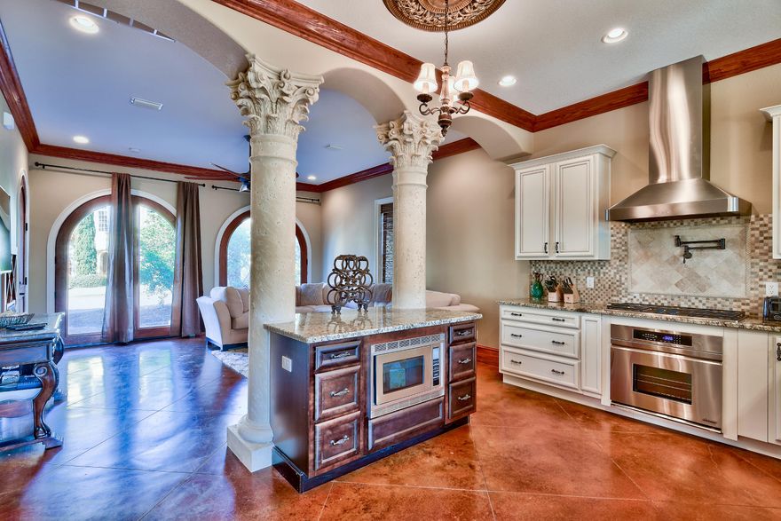 NEW CONSTRUCTION COMPLETED; this stunning Mediterranean property is located in the prestigious gated community of St. Tropez and sits directly on Scenic Hwy 98, minutes from the Sandestin Outlet Mall and adjacent to the beach with gorgeous Gulf views from the third story Master suite. This home was exceptionally designed to maximize functionality with an open floor plan concept. The kitchen, open to the living room and dining room, is elegantly appointed with granite counter tops, Dacor stainless steel appliances, including an oversized built in refrigerator, in lay travertine backsplash, hand made custom copper sink as well as a spacious island flanked by two floor-to-ceiling custom stone Corinthian columns which evoke the elegant style that is contiguous throughout the home.