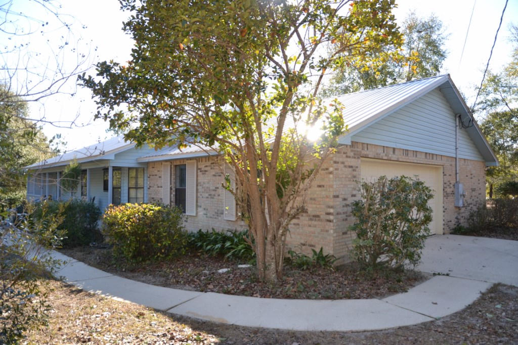 Grandview Heights home with 1.6+ Acres, and located in the County! Lower property taxes, and the Seller is providing a 1 Year American Home Shield Home Warranty! The Seller is offering to pay MOST of your CLOSING COSTS! 3 bed/2 bath, 1700+ sq. ft., Split Bedroom home is well maintained! The home features a Master Suite with separate cultured marble vanities, garden tub, separate shower, and 2 walk-in-closets. The Kitchen is fully equipped with all appliances, pantry, breakfast bar, breakfast nook with bay window, and plenty of cabinet space. The oversized garage has access to the Workshop attached to the home with a separate entrance for all your lawn care tools! Sit out on the back porch and enjoy the privacy of your acreage with plenty of space for outdoor games.....