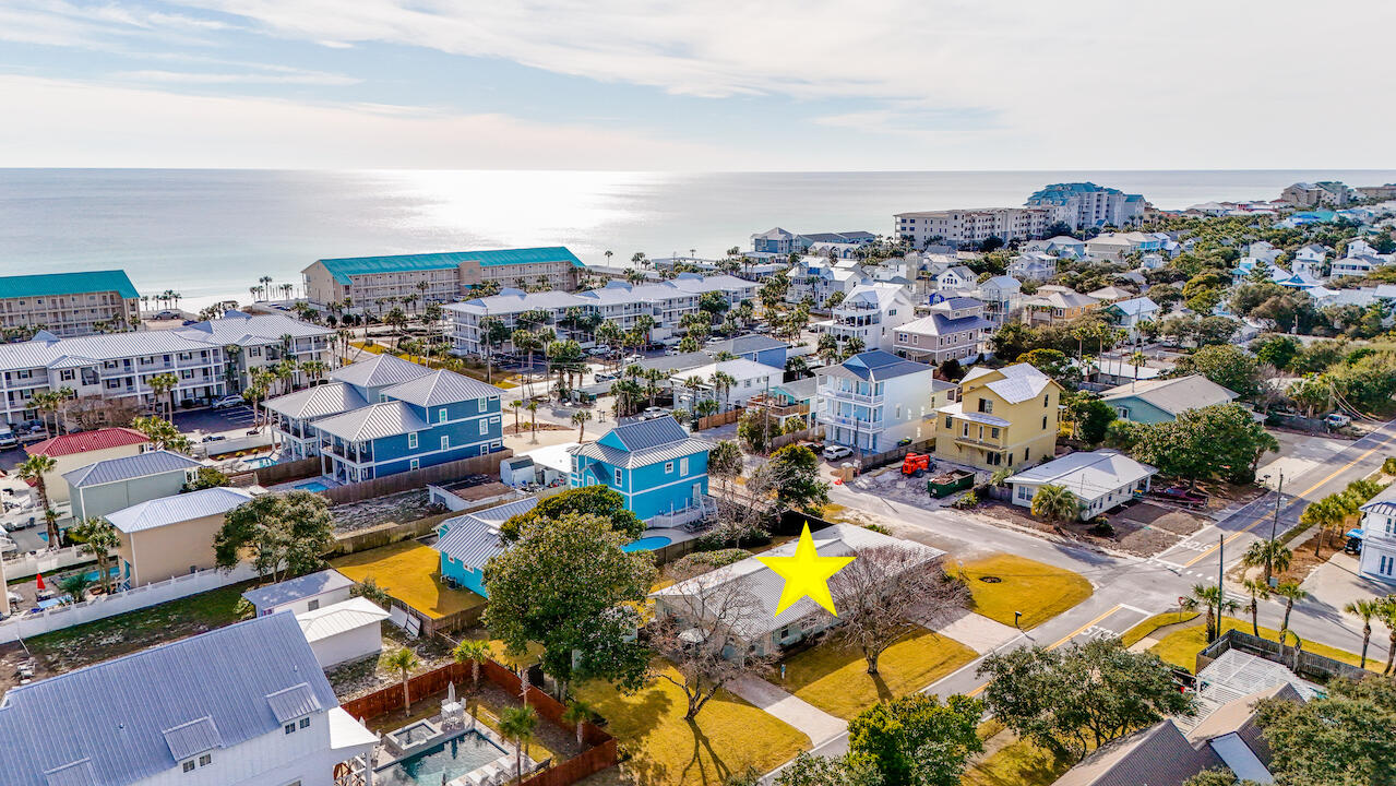 Welcome to your dream investment property in the heart of Destin, Florida! This ideally positioned triplex is a mere stroll from the sugar-white sands of Destin's renowned beaches and offers an incredible opportunity for savvy investors or those with a keen eye for development. Each unit in this triplex boasts a proven track record as a successful rental. Both end units consist of one bedroom and one bathroom and the center unit conveniently includes two bedrooms, one full bathroom and a half bath. All units have been tastefully updated and decorated. Take advantage of the multifamily zoning, opening the door to various development possibilities. Whether you choose to expand, renovate or explore other options, the potential is limitless.