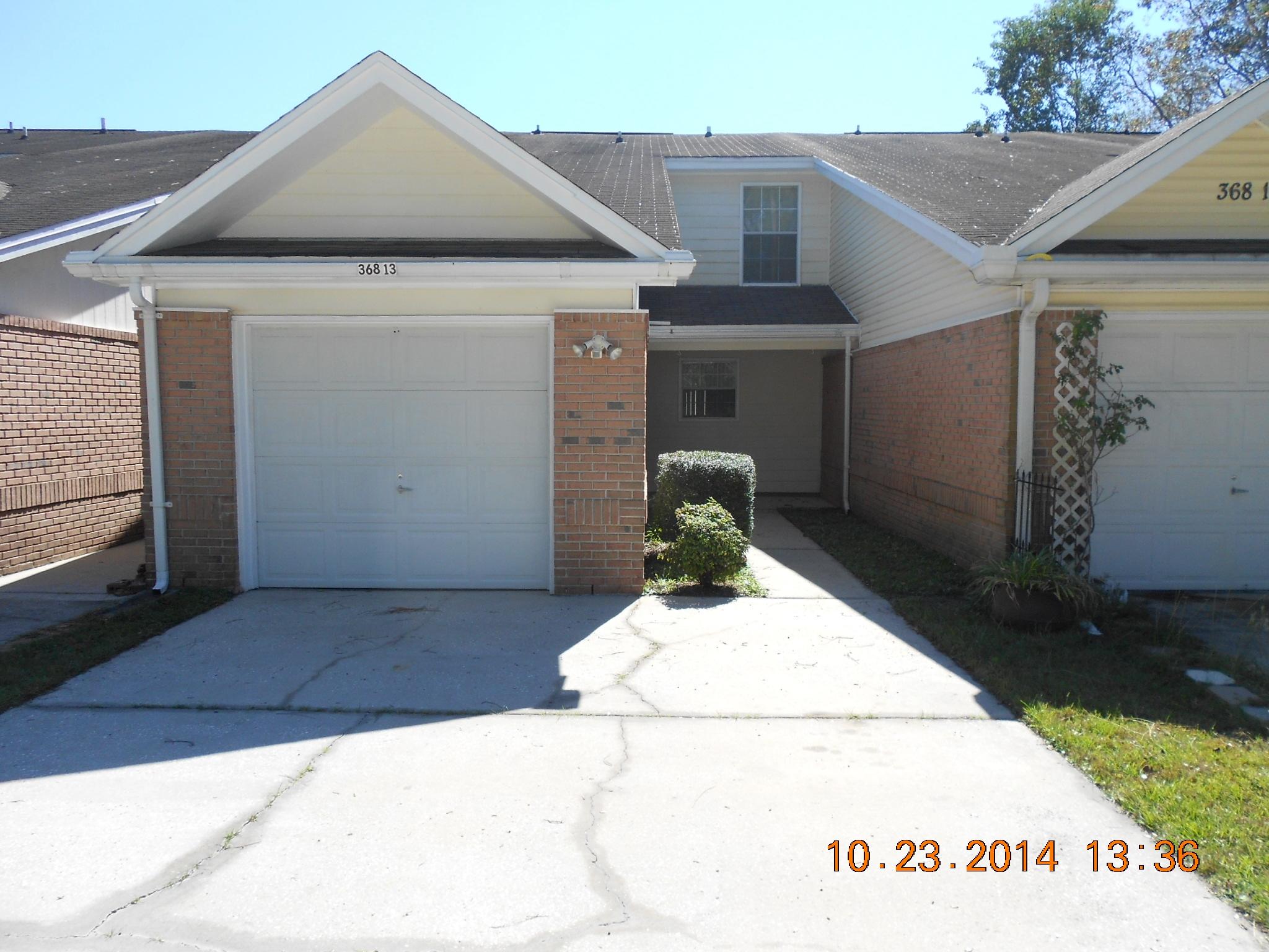 Great buy! This home features an open floor plan with living/dining combo and 2 huge bedrooms, freshly painted, new flooring thru out and one of the nicest townhomes around. AND it features a large 1 car garage with opener. Check out the size of the bedrooms and the full bath with 2 vanities and a dressing area. Master bedroom walk in closet. Close to both bases,shopping, churches. Great starter home or investment!!! Don't miss this lovely home!!