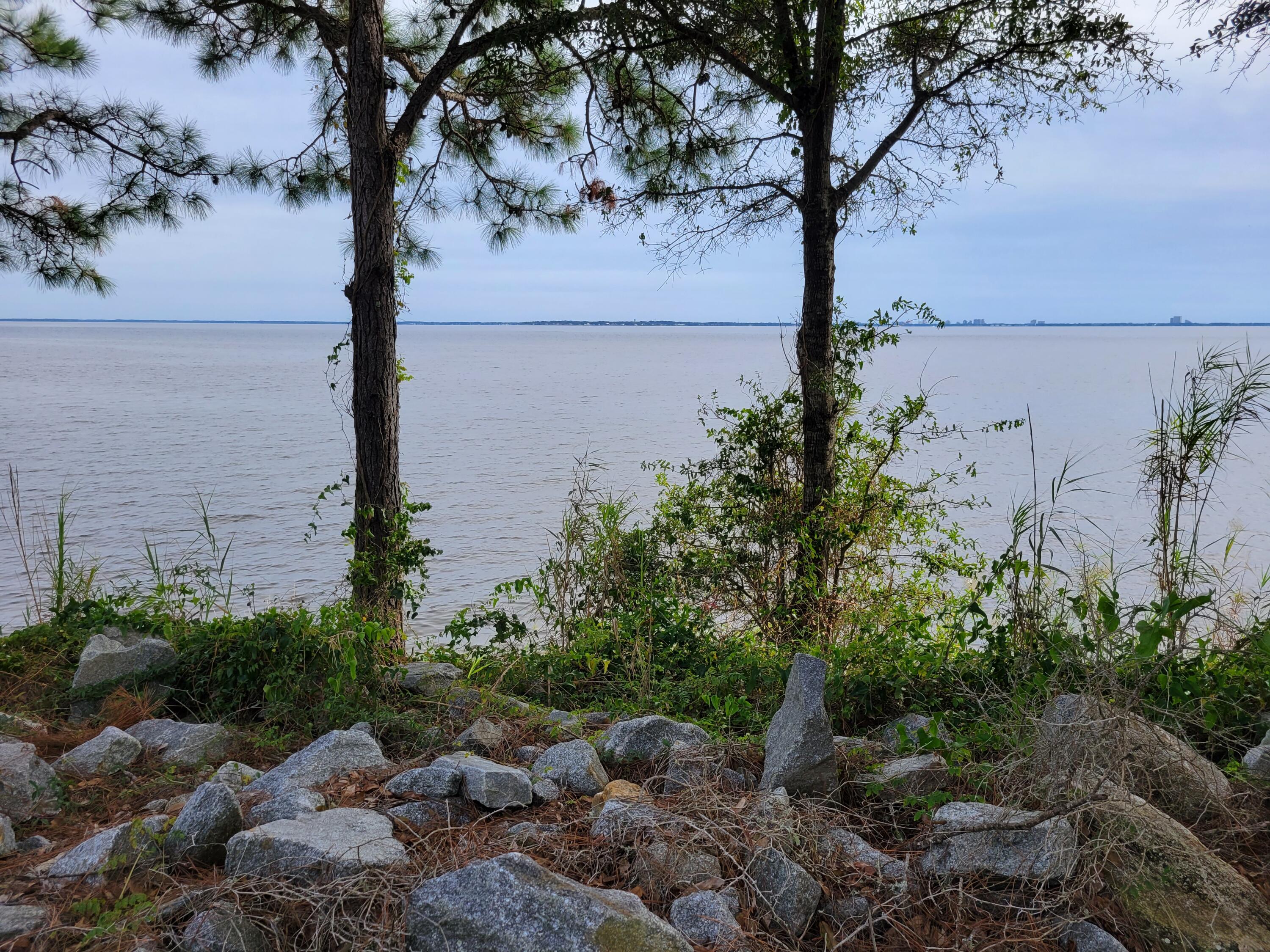 REDUCED!! Two great residential Lots available on Choctaw Beach with water view. Both lots to be sold together Zoned Rural Village. Lots are 150 width by 200 depth for 0.68 Acres. Build one large home or 1 home on each lot. Convenient to Niceville (Mid Bay Bridge), Destin and Freeport. Buyer will need to confirm dimensions, utilities and zoning restrictions. The County states each lot is allowed 1 home or 1 home could be placed on both lots.