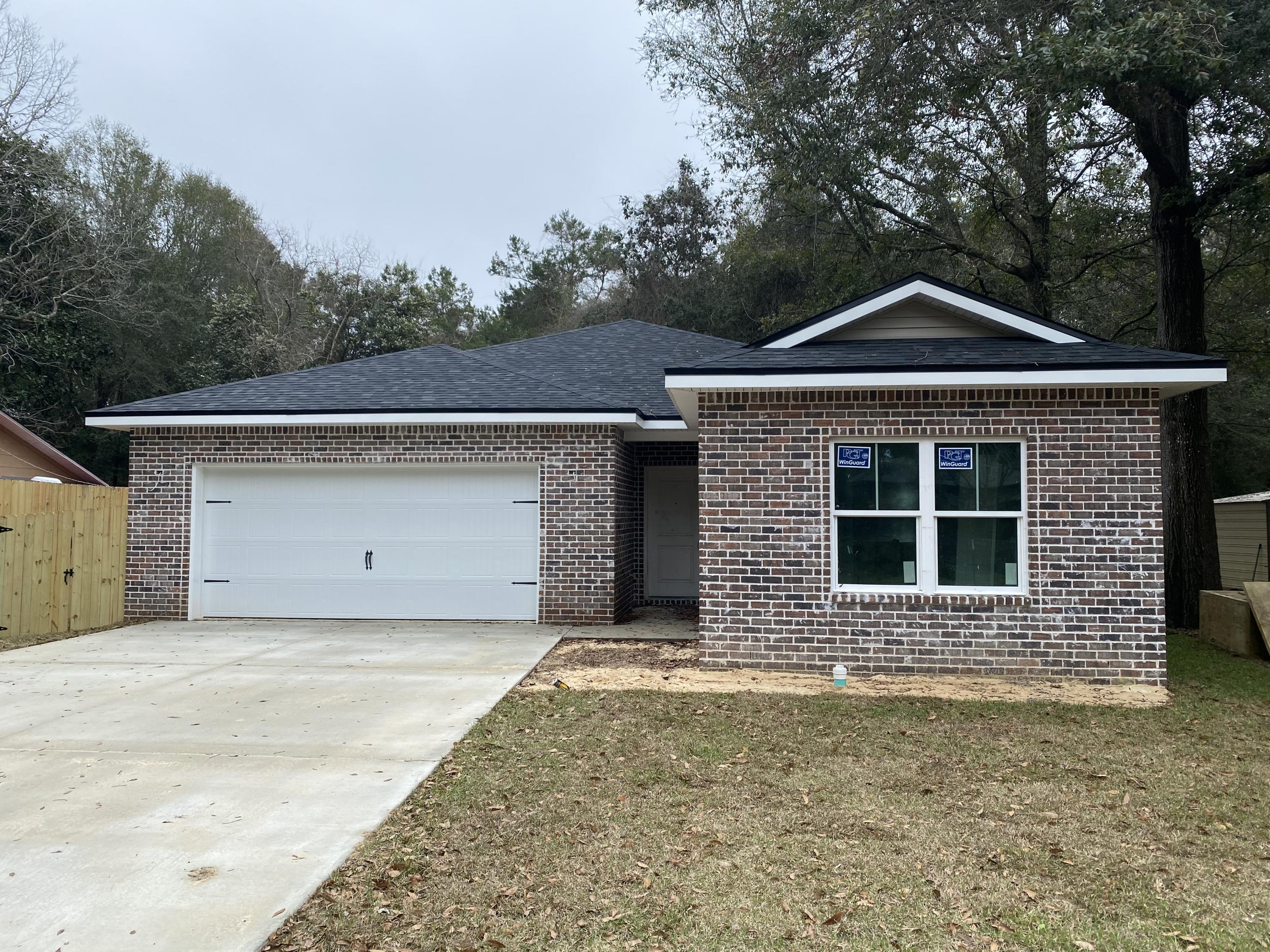3 bed 2 bath in the center of Niceville. Open floor plan with white shaker cabinets, granite countertops, stainless appliances. LVP flooring in all the living areas, tile in the bathrooms, and carpet in the bedrooms. The master bathroom, has a stand alone shower, free standing soaker tub, double vanity, and a large walk in closet. The exterior has a wood deck, wood privacy fence, and fully irrigated yard.