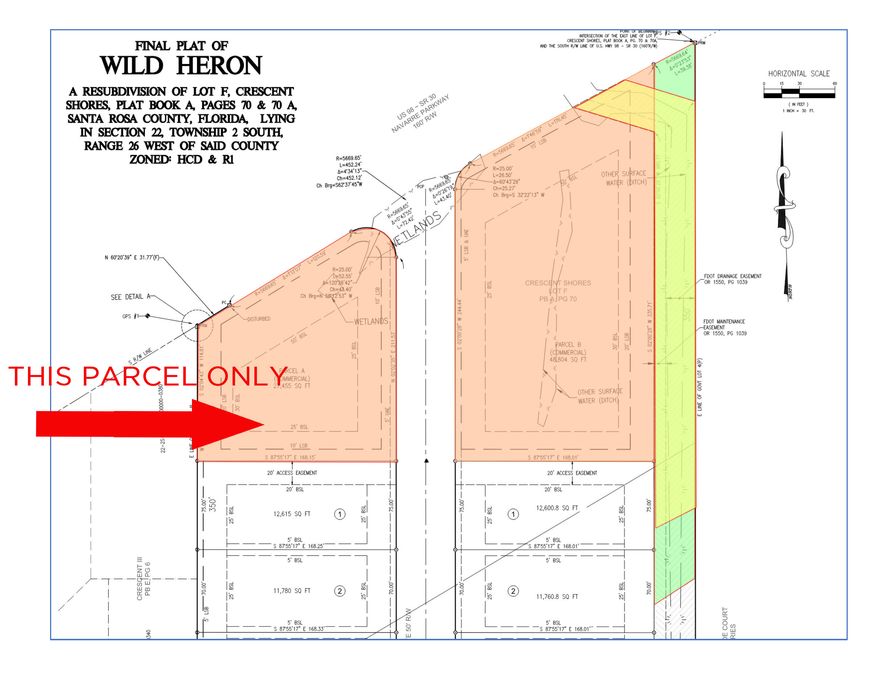 This is one of two vacant commercial land parcels fronting Highway 98 in front of the new Wild Heron subdivision.