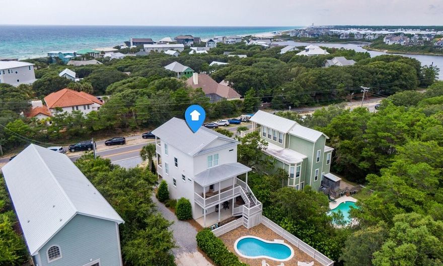 Built in 2014 & sitting on an oversized lot, this fully-furnished investment property on the east end of 30A provides a large private pool & outdoor deck along with 4 bedrooms & Gulf Views on the top floor. Supremely located near Rosemary Beach & The Hub, you can be to the best shops & restaurants in a quick golf cart ride. This lovely home, built in 2014, has a wonderful layout, built for entertaining & maximizing rental income. There are two guest bedrooms & a full bath on the first floor with the entrance to the back porch/pool area right outside. The beautiful kitchen & coastal living space is placed on the second floor which also provides access to the back patio/pool.
