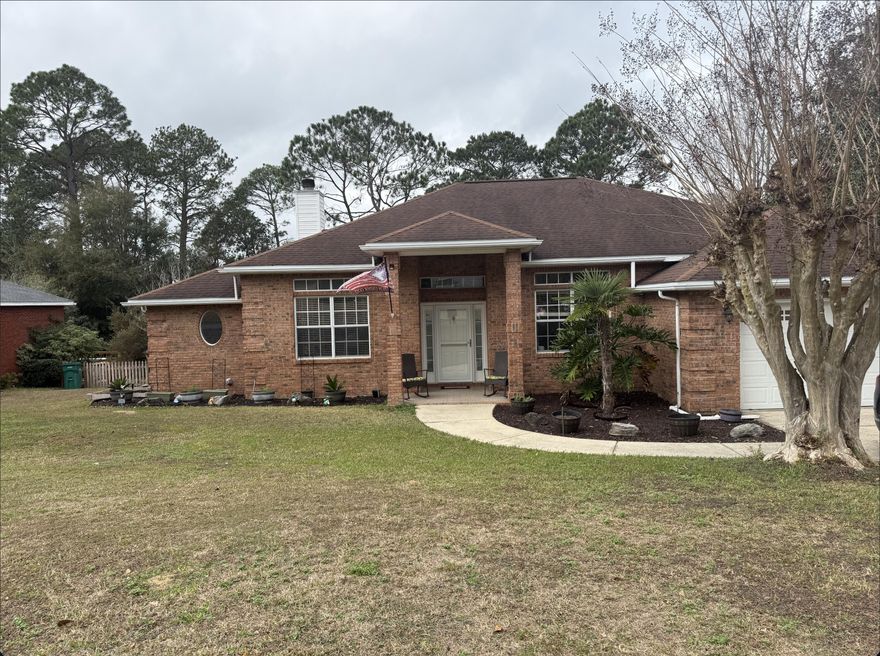 Over half an acre in South Crestview, this 3-bedroom, 3-bath home with a formal dining room offers a functional layout and generous outdoor space. The main living area features two sliding glass doors that open to a large back porch and deck, creating a natural connection to the backyard. The kitchen provides bar seating, a breakfast nook, ample cabinet and counter space, and has been refreshed with granite countertops and updated appliances. A split floor plan places the primary suite apart from the additional bedrooms and includes two walk-in closets, dual vanities, a soaking tub, and a separate walk-in shower. The additional bedrooms are well sized, and the fully fenced backyard offers plenty of room to enjoy the property. Schedule your showing today.