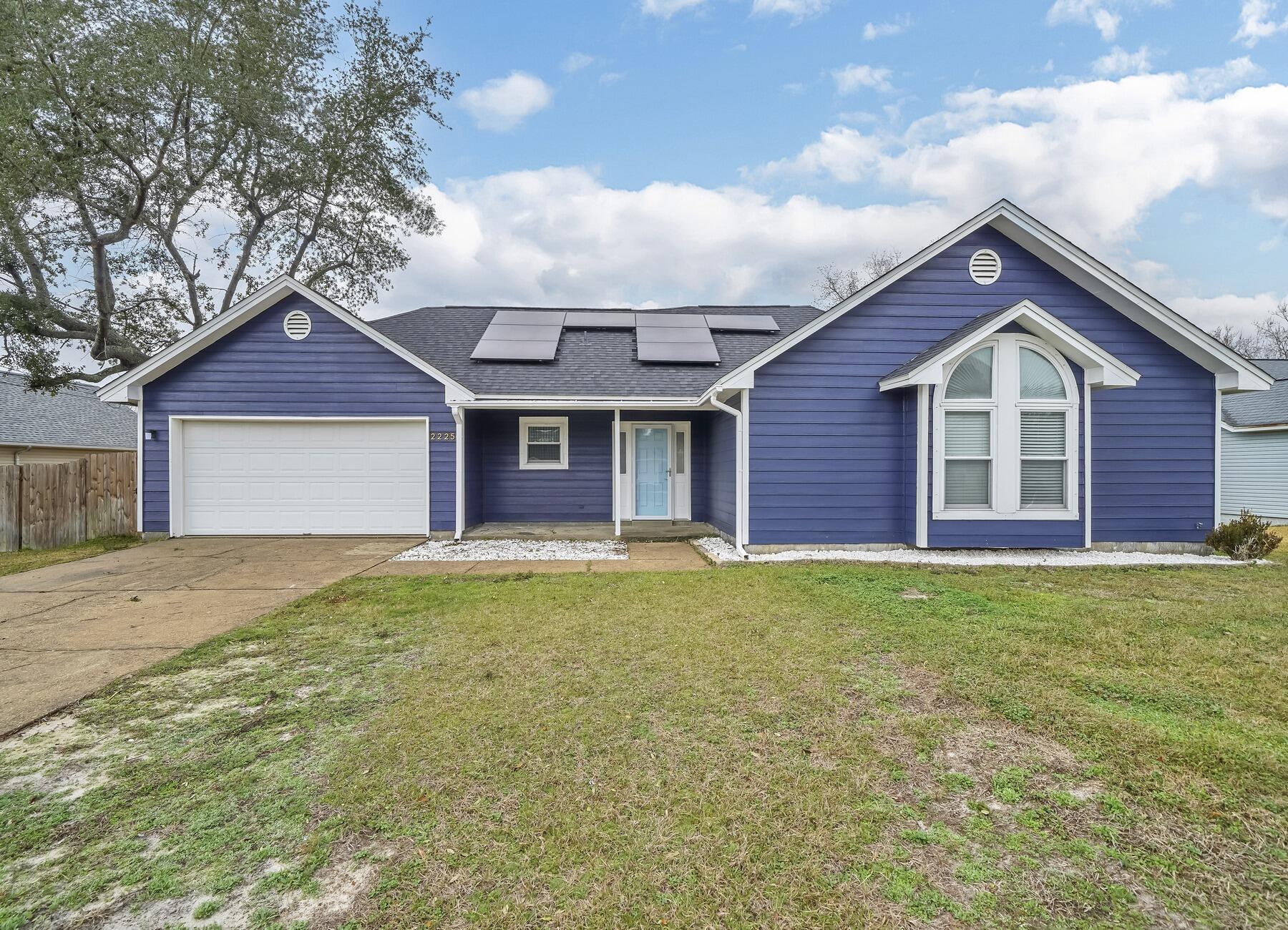 AVAILABLE... March 17, 2025!! 3bd/2bth home located in East Navarre for a quicker commute to Hurlburt Field AFB! This charming light blue home boasts solar panels and upgrades throughout the entire home! The home features a fully fenced yard, a double car garage, new stainless steel appliances and a corner fire place in the family room. The back doors exit to an amazing deck space for entertaining and grilling out. NO smoking. Pets allowed upon approval with a non-refundable pet fee. NO smoking. 600 minimum FICO credit score required in addition to meeting rental criteria. Pets allowed upon approval with a non-refundable pet fee. All applicants are required to complete an application on https://onefamilypropertyservices.petscreening.com/ regardless of if they own a pet or not.  Applicants with an ESA are also required to complete the application.

** Fees Required once an application is approved include, but may not be limited to: Security Deposit, Non-Refundable Fees (cleaning and rekey), $20 Certified Mail Fee, and Pet Fees (when applicable).