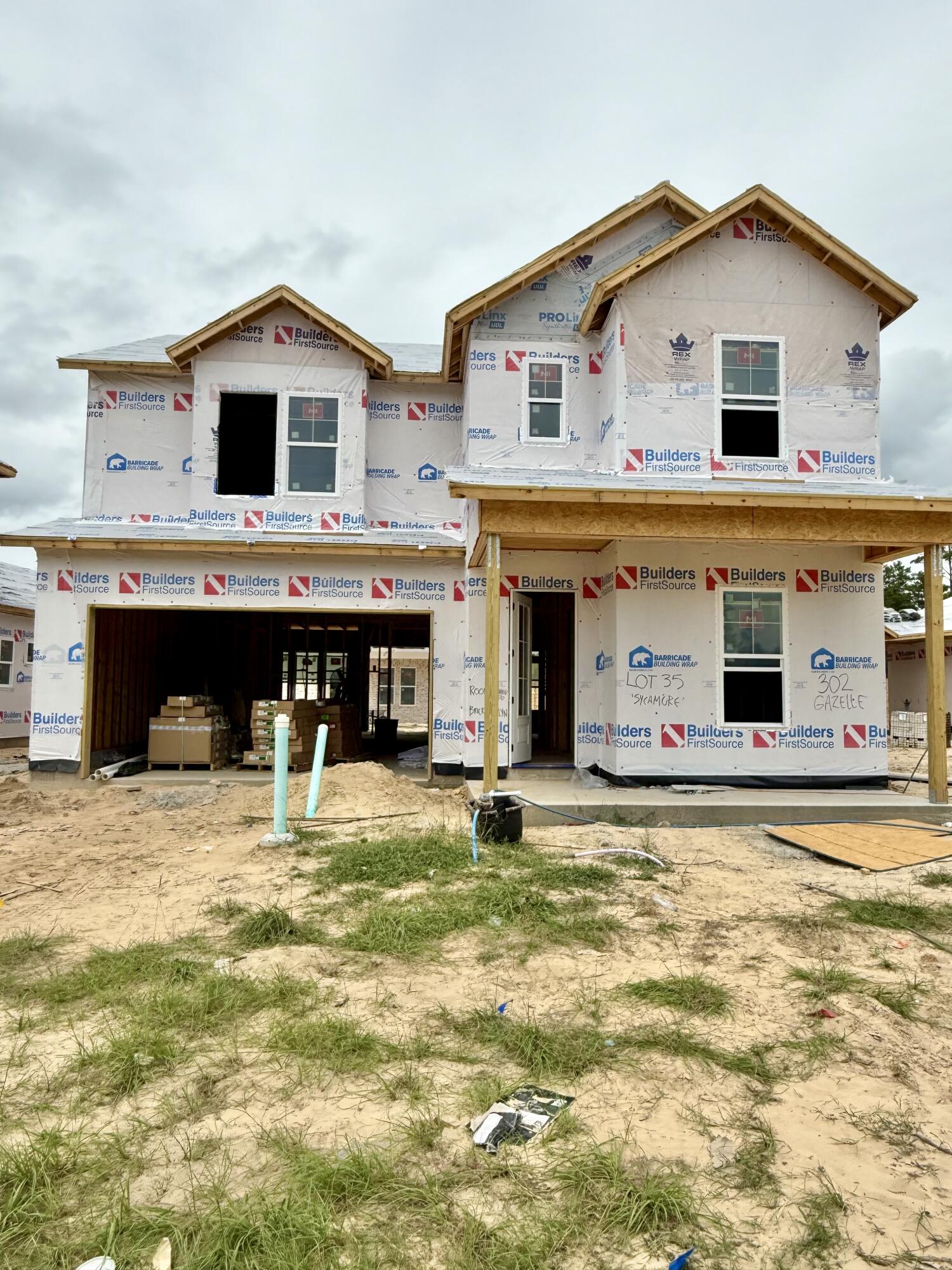 Estimated completion November 2025 for this beautiful two-story home, the Sycamore Plan. This home has 2450 sq ft of meticulously designed space with 4 bedrooms and 3 full baths! The primary bedroom and gorgeous en-suite bath are located upstairs along with 2 other bedrooms and another full bath. The laundry room is also upstairs making for ease and convenience! Downstairs you'll find a well-equipped kitchen with shaker cabinets, quartz countertops, gas stove and a large walk-in pantry. Durable LVP flooring throughout (with tile in the wet areas) too! Deer Moss Creek Community Clubhouse, now complete, offers a swimming pool, clubhouse, playground, basketball court just minutes away.