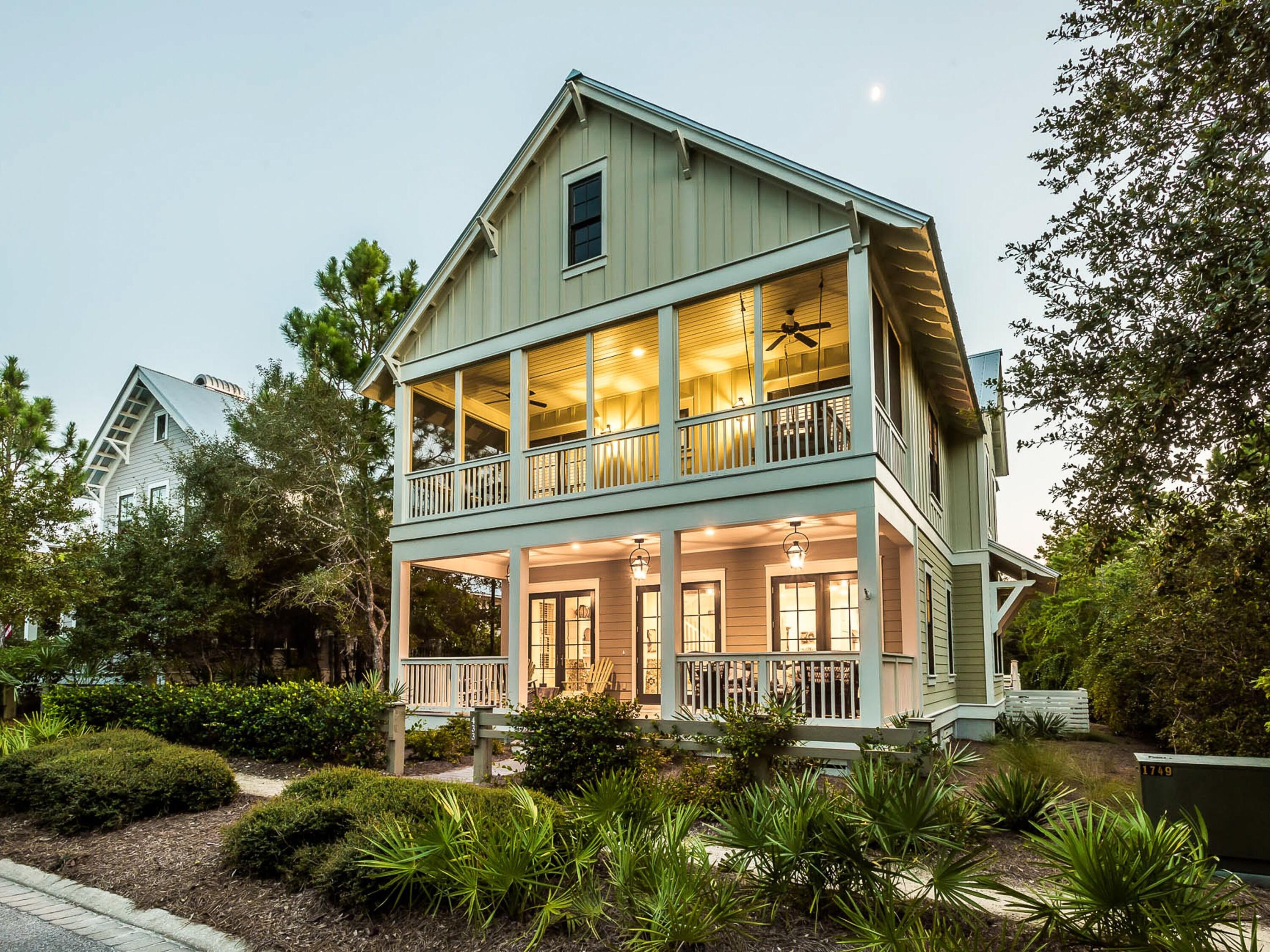 This charming Florida cottage in WaterColor has a large pool area and many noteworthy features. Wire-brushed oak flooring and reclaimed oak beams tie the house to its natural surroundings with wooded preserve on two sides creating unrivaled privacy and tranquility. The open floor plan lends itself to groups and family gatherings with ample space for chatting and socializing beneath the beamed ceiling. The kitchen area with its maple cabinets and granite countertops is packed with extras for chefs and entertainers. There's a six-burner gas stove with a griddle for making stacks of breakfast pancakes while the double oven, two-drawer dishwasher, apron sink and ice maker take care of entertaining.