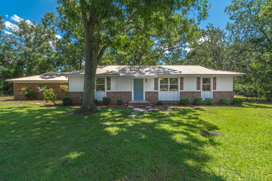 If you are in the market for a country charmer with a little peace and quite this home is a must see.Your new home includes an oversized 2 car garage and sits on an acre corner lot with a wooded boundary for extra seclusion. To top things off your new home has been almost completely gutted/remodeled inside and freshened up outside. Inside you will find new flooring throughout, new doors, new double pane low e glass installed in the windows, new texture on the wall and ceilings, new paint/trim, new cabinets/countertops throughout, tiled showers, new plumbing and light fixtures to name a few. Home features a semi open split bedroom floor plan that is great for having family and guest over. Outside you will find fresh paint, new exterior doors, and shutters to name a few. Call before its gone