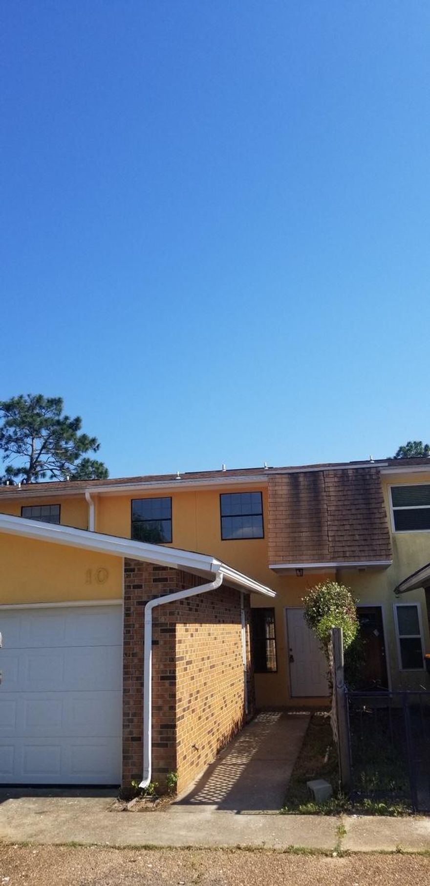 BETTER THAN NEW! Totally renovated townhouse situated in the heart of Shalimar! Large eat-in kitchen with new cabinets, new counter tops and vinyl plank tile flooring. Spacious living room with new carpet flooring throughout and sliding glass doors that lead out to the patio. Half bath is conveniently located off the living area. Large master bedroom with it's own private bath. Master bath has new vanity, quartz counter top, new flooring and shower. Two additional bedrooms and another full bath upstairs. Don't miss the laundry/utility room over the patio. All of this and a garage too!! New roof in 2014. Close to schools, shopping, restaurants and both Eglin AFB and Hurlburt. Call today !!