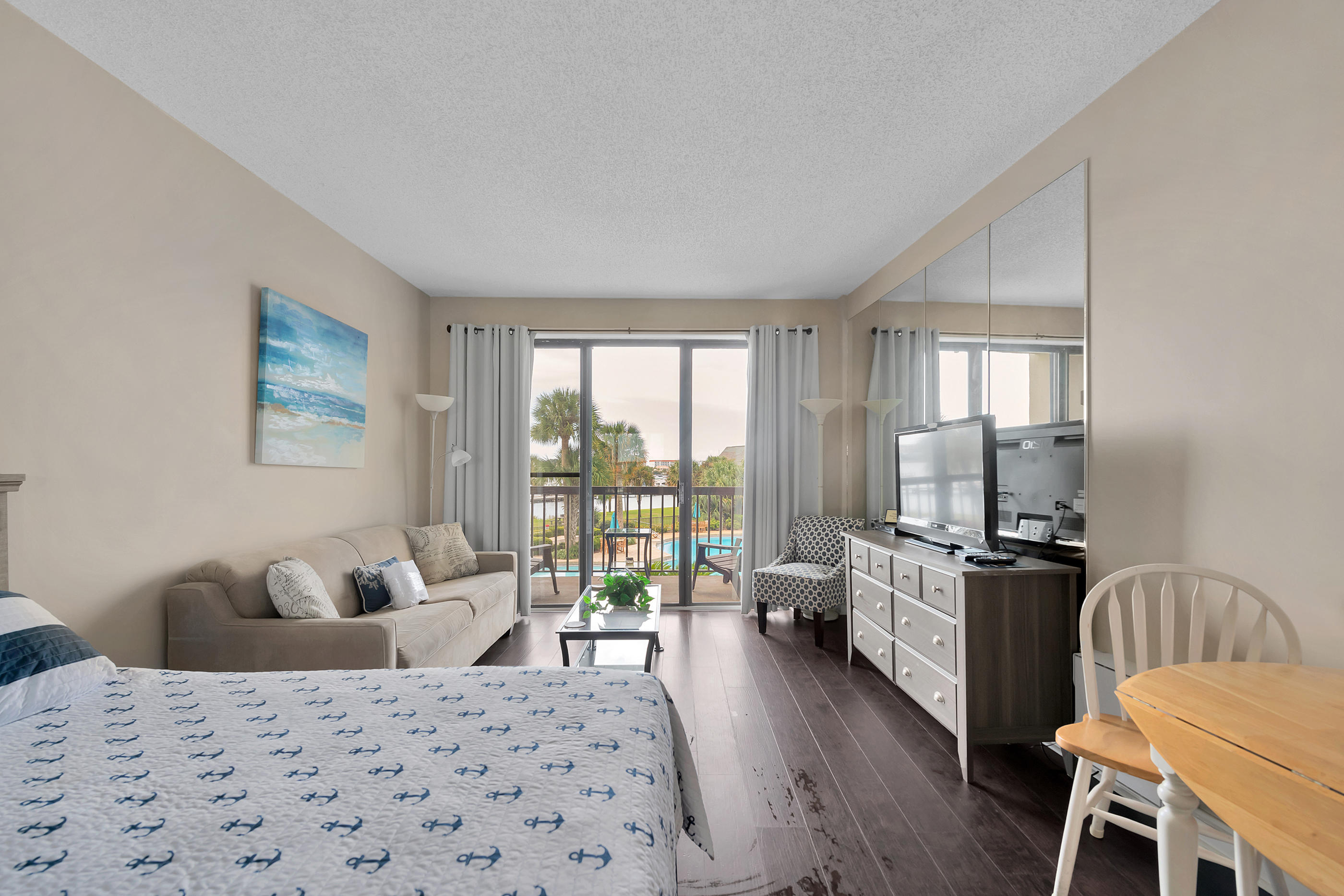 Looking for an Affordable Waterfront Condo- you've found it!! This beautiful waterfront studio condo, overlooking the pool area, has been fully remodeled with updated bathrooms, tile floors. fresh paint, new furnishings, new flooring, and more! Condo includes a 20' boat slip, with power lift, that has power and water AND the ability to lease out long term. Slip D6. This condo is a vacation rental with strong rental income. Turn key, ready to go! The condo is being sold furnished, complex allows pets, and association dues include water, sewer, trash, cable, Internet, exterior insurance, general marina maintenance and more!