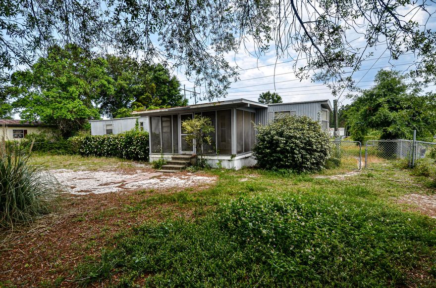 This home is on .321 acres and has an existing 1976 manufactured home in place that has been a rental property for many years. This 2 bedroom, 1 bath home could be used as a rental, primary residence or removed to build a new home. The house has a metal roof with peel and stick, central air and is in overall good condition. Could be gutted and remodeled. Cash Buyers only.