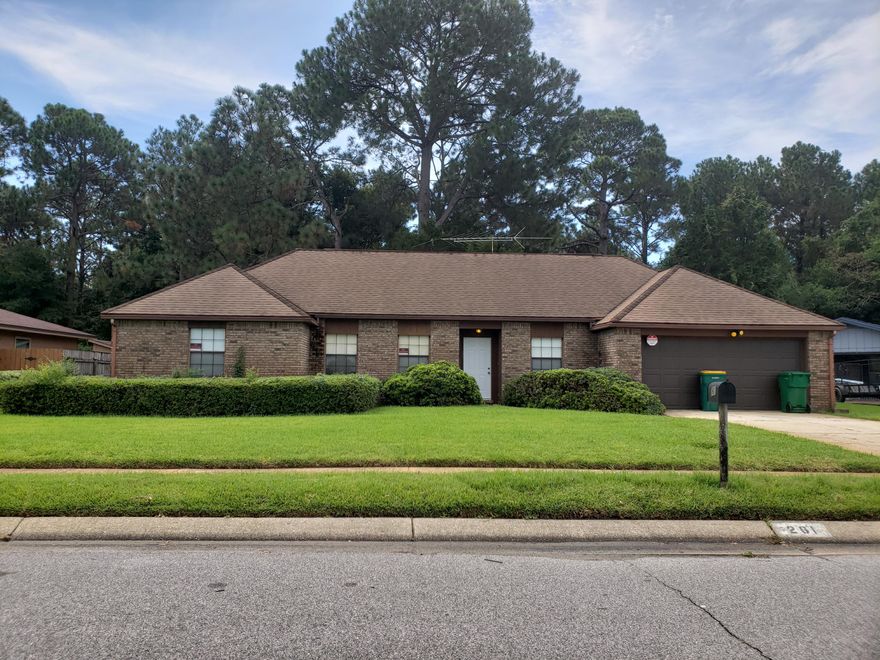 This all brick beautifully landscaped well kept home in North Gate is central to everything in Fort Walton Beach less than 5 minutes to schools and shopping. New paint wood laminate flooring. This home features a living room, dining room and separate den /family room with brick wood burning fireplace. The home also features 2 water heaters with water filtration system; solar panel on the roof AND wired for whole house generator. This home is privacy fenced and features multi zone sprinkler system. If you are looking for space and affordability this is a must see. Call today for your personal showing