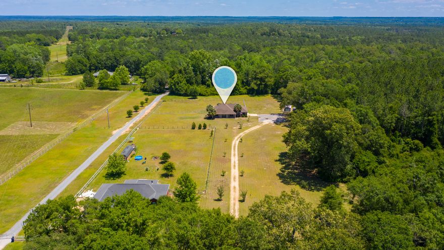 Country getaway of your very own with easy commute to the local bases, beaches and shopping centers. This beautiful 3 bedroom 2 bath on 3 acres is ready for you to call it home. As you step in you can envision entertaining family and friends in the large living room which is open to the huge kitchen. Kitchen boasts ample granite counter and cabinet space for all your cooking needs. The split floor plan allows for privacy and retreat into your master suite. Huge master-bath with his & her vanity, separate shower and tub. Home is also wired for surround sound. There is a flex room as well as dining area. Brand new HVAC installed in April of 2020, 50amp RV hook up and large 12x20 workshop ready to store all your toys, tools and provide additional storage. Come out to the country & enjoy!!!