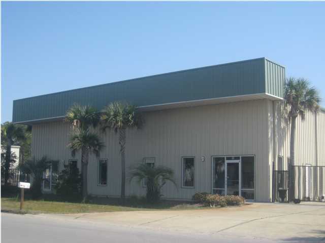 PRICE REDUCED!! ATTRACTIVE, BEAUTIFULLY LANDSCAPED, PROFESSIONAL OFFICE/WAREHOUSE IN SANTA ROSA BEACH INDUSTRIAL AREA..3762SF WAREHOUSE/957SF OFFICE/957SF 2ND FL STORAGE ABOVE OFFICE..BLDG IN EXCELLENT CONDITION..WIRED FOR PHONES AND CAT 5..INGRESS/EGRESS DRIVE AROUND BLDG..LARGE SHOWROOM, 4 OVERHEAD DOORS, SECURITY SYSTEM, SECURITY LIGHTS, AND FENCE WITH ROLLING GATES SURROUNDS CONCRETE PARKING/YARD AREA..INDUSTRIAL ZONING/LAND USE..