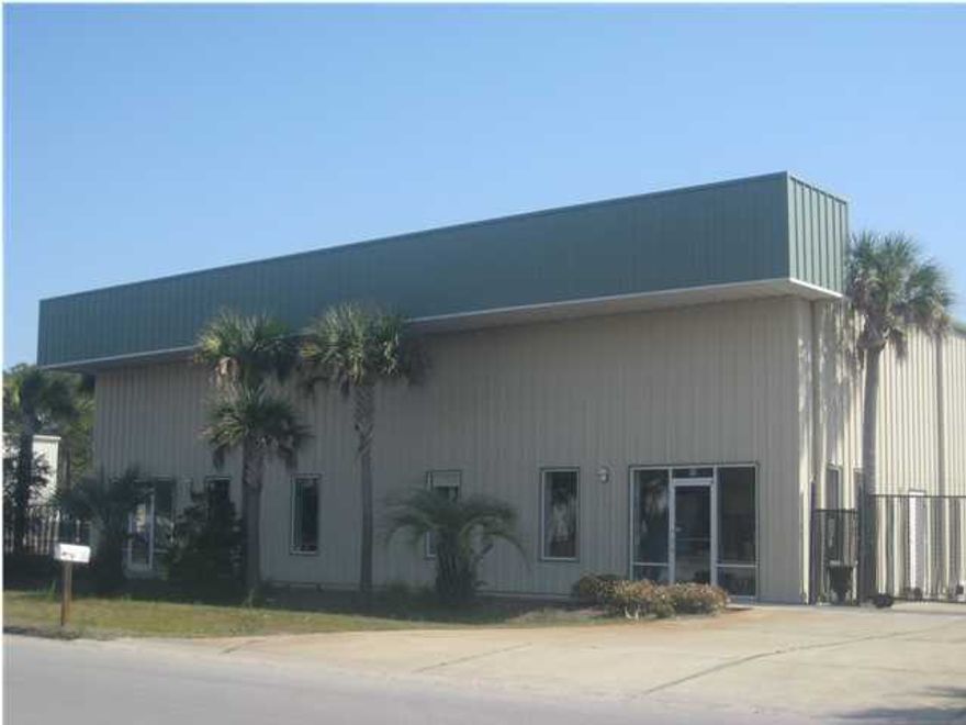 PRICE REDUCED!! ATTRACTIVE, BEAUTIFULLY LANDSCAPED, PROFESSIONAL OFFICE/WAREHOUSE IN SANTA ROSA BEACH INDUSTRIAL AREA..3762SF WAREHOUSE/957SF OFFICE/957SF 2ND FL STORAGE ABOVE OFFICE..BLDG IN EXCELLENT CONDITION..WIRED FOR PHONES AND CAT 5..INGRESS/EGRESS DRIVE AROUND BLDG..LARGE SHOWROOM, 4 OVERHEAD DOORS, SECURITY SYSTEM, SECURITY LIGHTS, AND FENCE WITH ROLLING GATES SURROUNDS CONCRETE PARKING/YARD AREA..INDUSTRIAL ZONING/LAND USE..