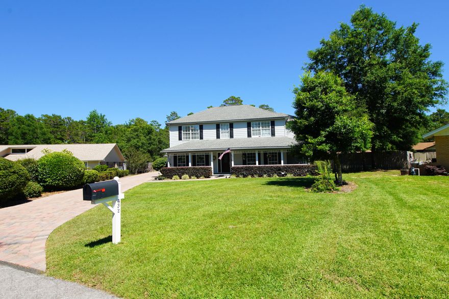 Bluewater Bay 4 bedroom home on almost a half acre cul de sac lot provides privacy and serenity. The wrap around porch is the perfect spot for morning coffee and newsfeed checking or for afternoon refreshments with friends. The climate controlled Florida Room provides a third living space so there's a gathering spot for everyone. The kitchen has workable space for the chef and a nook, overlooking the spacious backyard, for casual dining.
Hardwood floors downstairs. Master offers double vanity, garden tub and walk in shower. Is there a hobbyist in the house? This home will be perfect. Owner converted the 2 car garage to a quilting room but would also provide space for other hobbies, classroom, playroom or home office. This conversion was professionally done and looks like original construction. An oversized double detached garage and driveway pavers were added.  Master suite features two closets, garden tub, separate shower and double vanity. There are formal areas for entertaining (living and dining Rooms) and a family room with cozy fireplace. Seller has a current termite bond with Florida Pest (includes Formosan). French drain installed in back yard for drainage. HVAC replaced 8-18. Exterior painted and caulked 2-19. Seller is providing an Old Republic limited home warranty for buyers' peace of mind. Bluewater Bay offers tennis, golf, pools (requires membership), a marina, bike and walking trails. It's just across the Midbay Bridge to Destin for shopping, fine and casual dining, entertainment and our world famous and award winning beaches.