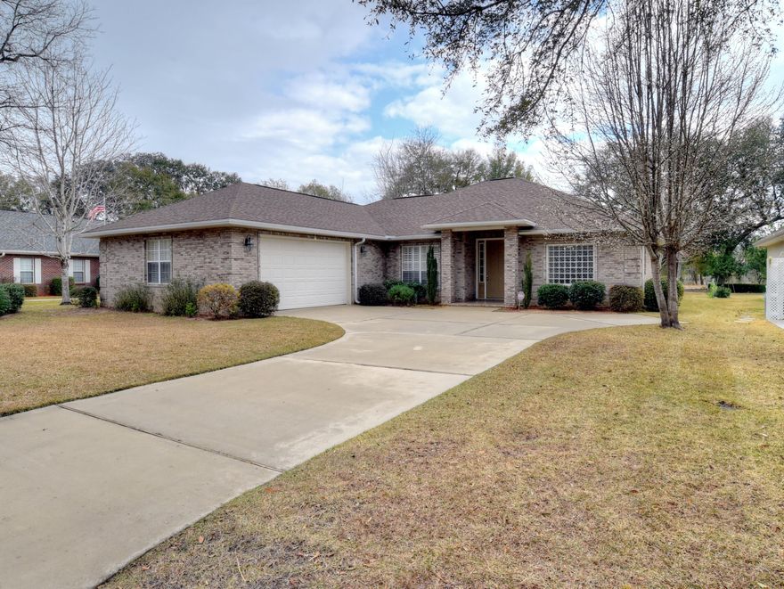 This beautiful like-new home has been meticulously maintained and designed for carefree living. All floors are tile and all surfaces are hypo allergenic. The design is one level and all hallways and doorways are extra wide to accommodate a wheel chair if necessary. The floor plan is very open and has lots of glass making each room bright and filled with sunshine. All windows and doors are hurricane rated for safety and peace of mind. There is a screened porch off the main living area and another sun filled patio just off the screened porch. Both outdoor living areas have gas connections for outdoor cooking. There is a gas fireplace in the main living area and a breakfast room off the kitchen plus a formal dining room. The bedrooms are arranged in a split plan for privacy.